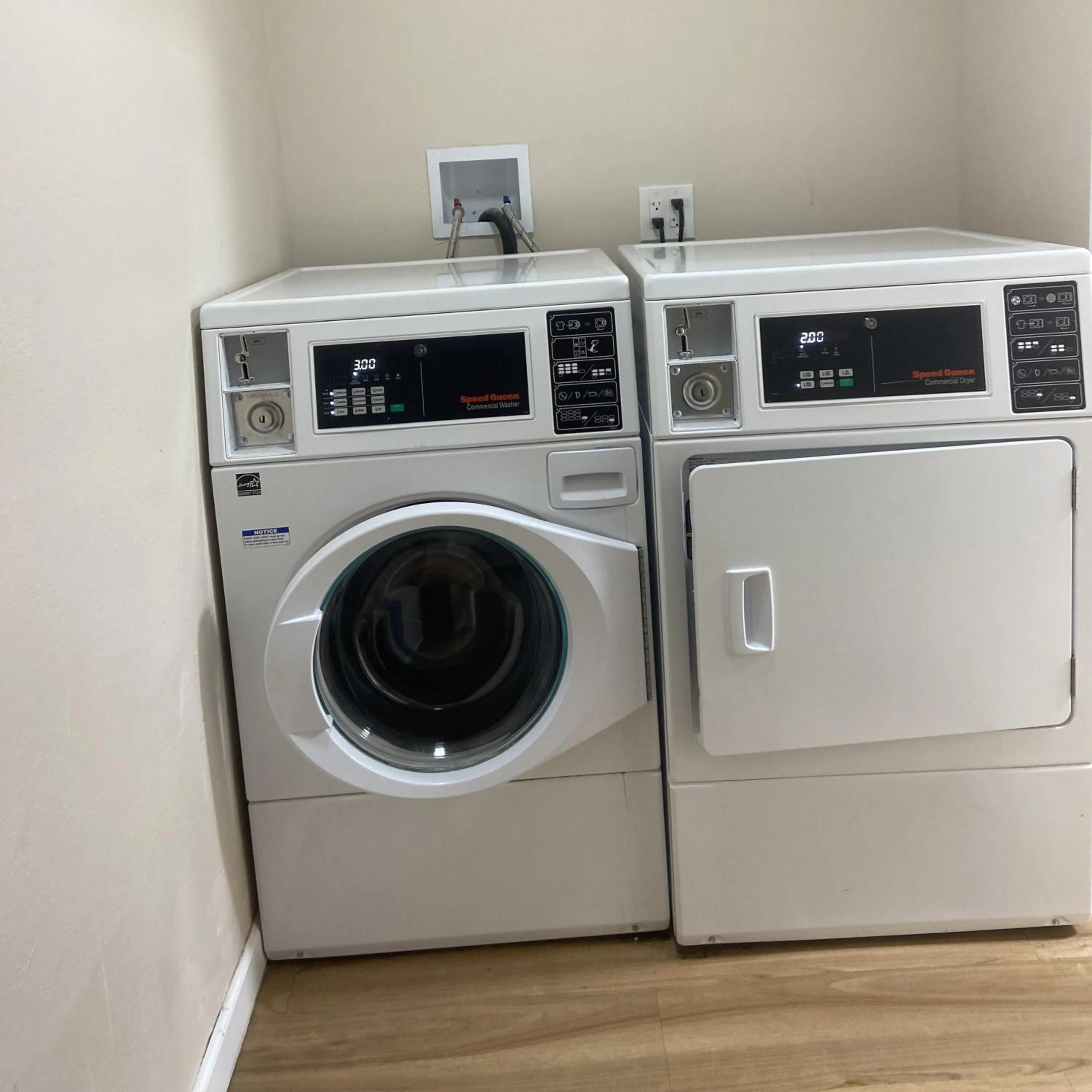 laundry in HomeTowne Studios by Red Roof Painted Post