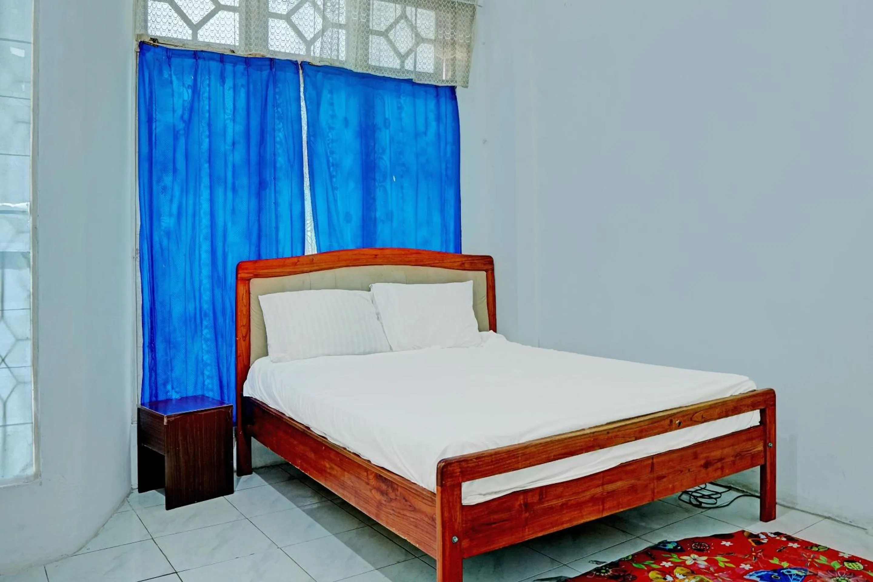 Bedroom, Bed in Hotel O Kost Axcel