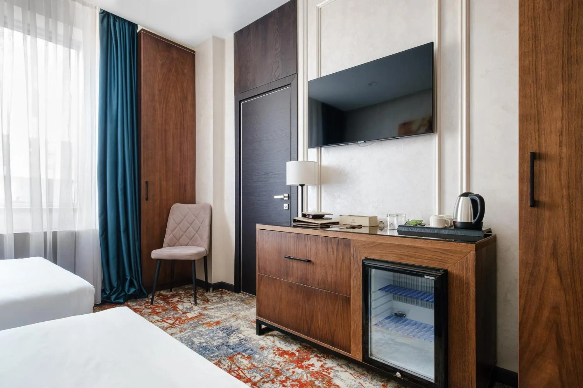 Coffee/tea facilities, Bed in Grand Mildom Hotel