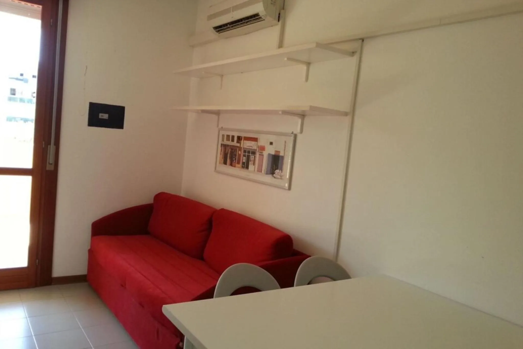 Living room in Bright sea front apartment with terrace-Beahost
