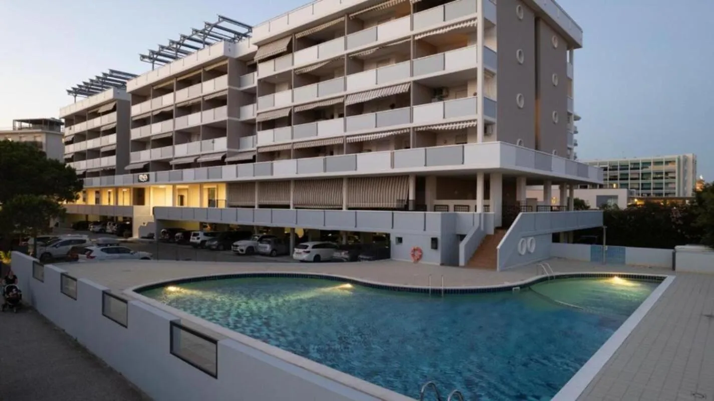 Swimming pool in Bright sea front apartment with terrace-Beahost