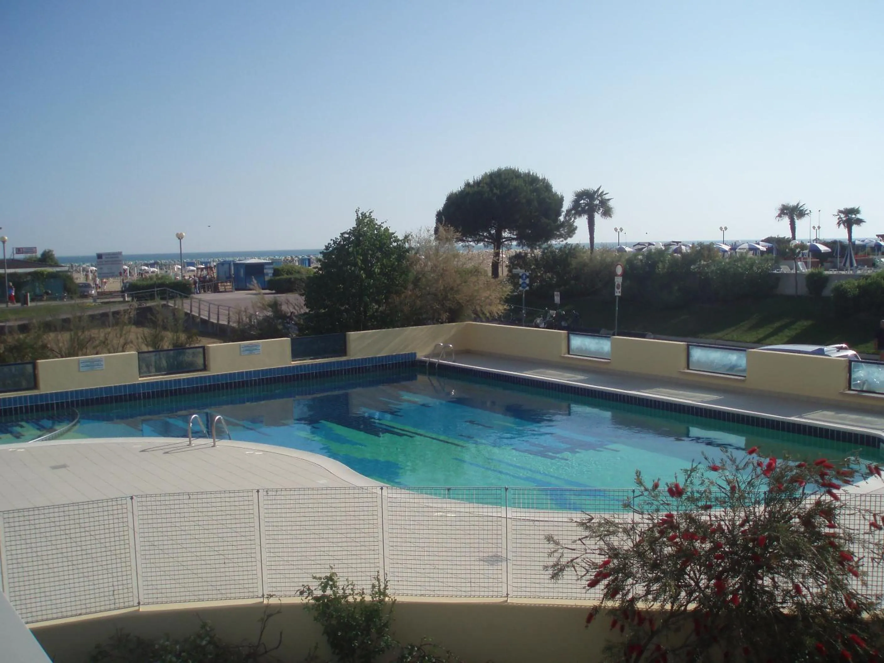 Swimming pool in Bright sea front apartment with terrace-Beahost
