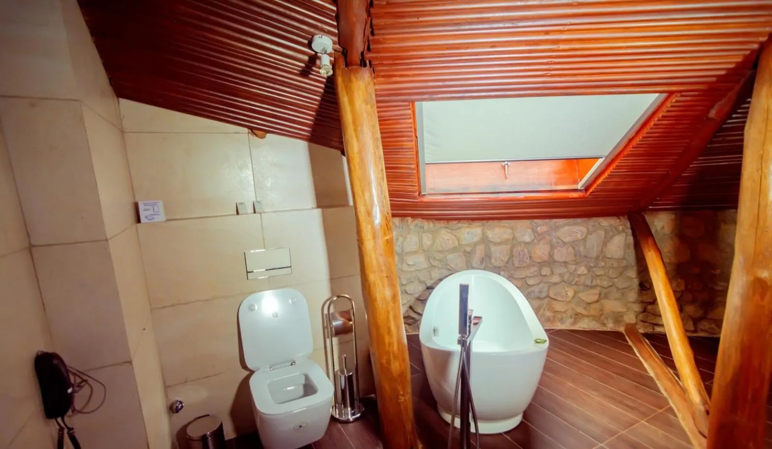 Toilet in Trois Ore Residences & Green Earth Bistro