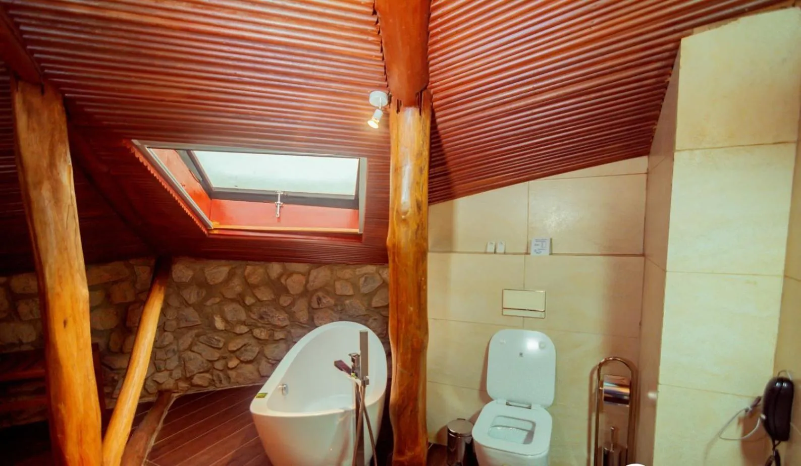 Toilet in Trois Ore Residences & Green Earth Bistro