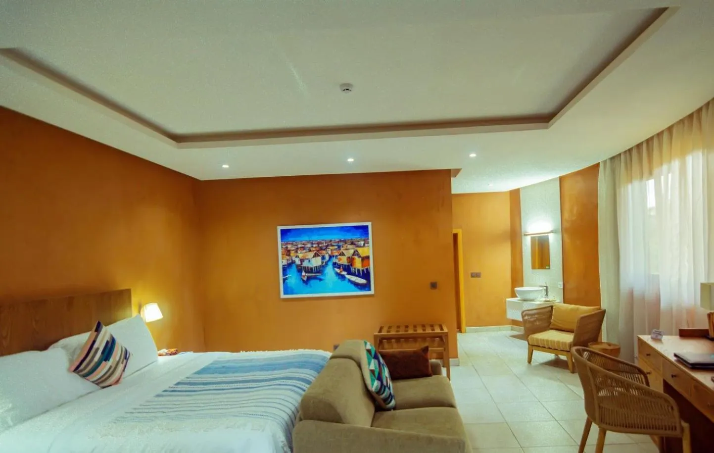 Bed in Trois Ore Residences & Green Earth Bistro