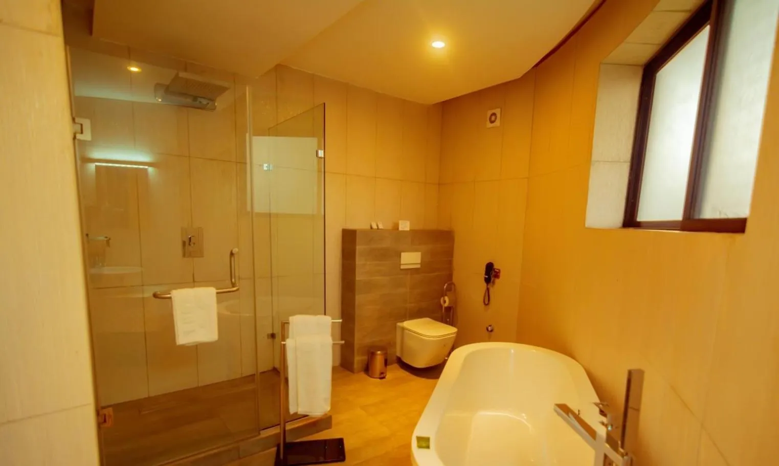 Shower in Trois Ore Residences & Green Earth Bistro