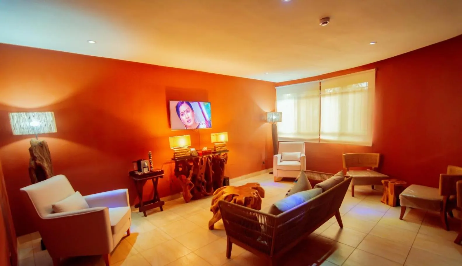 Communal lounge/ TV room in Trois Ore Residences & Green Earth Bistro