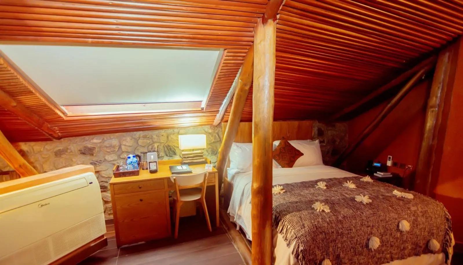 Bed in Trois Ore Residences & Green Earth Bistro