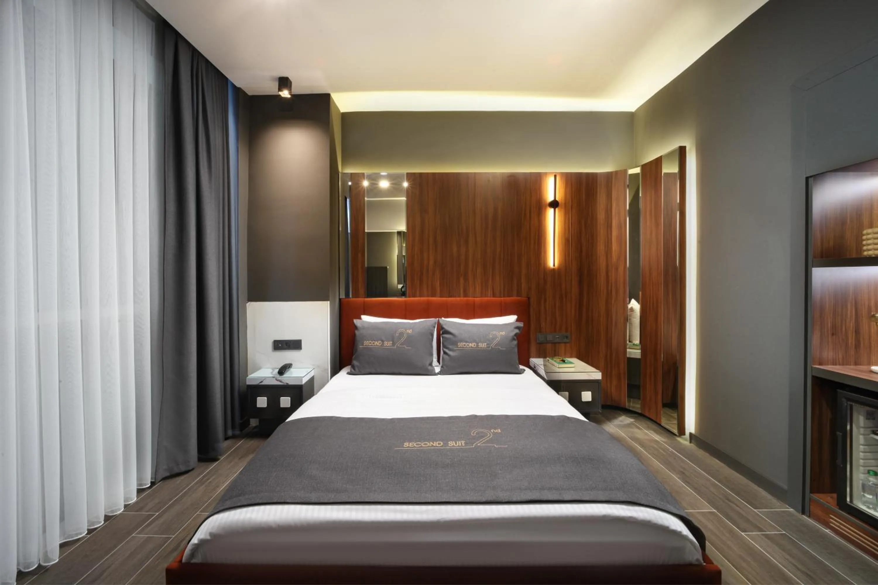 Bed in Second Suit Hotel