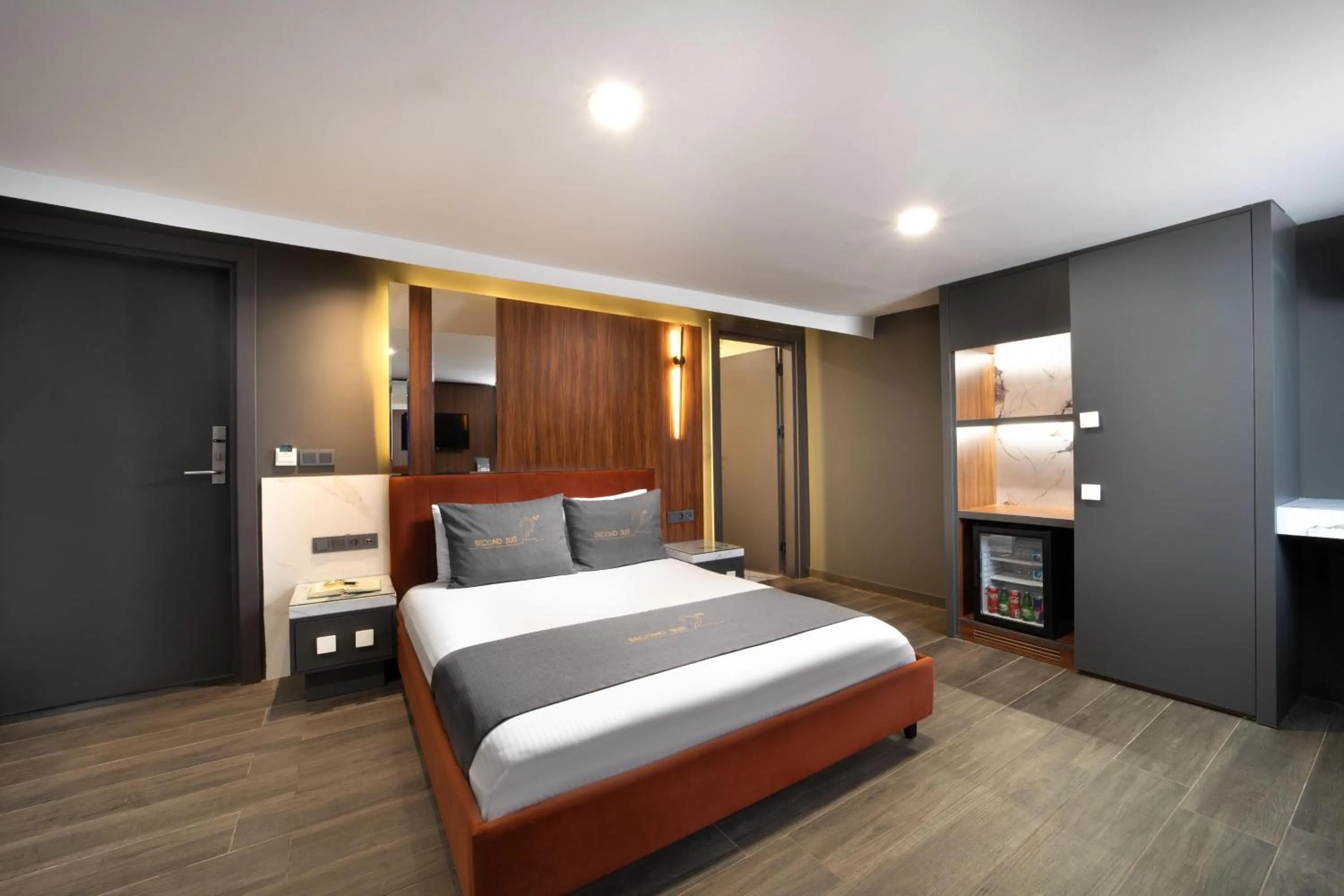 Bed in Second Suit Hotel