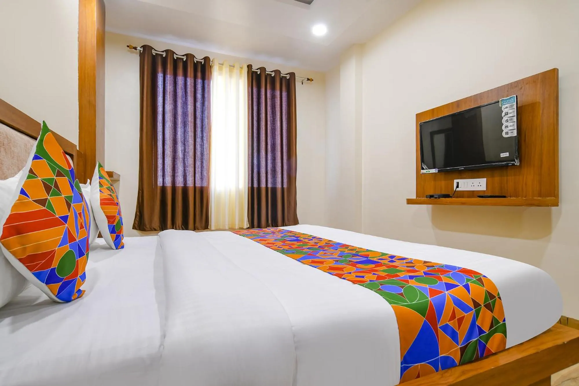 Bed in FabHotel Atharv