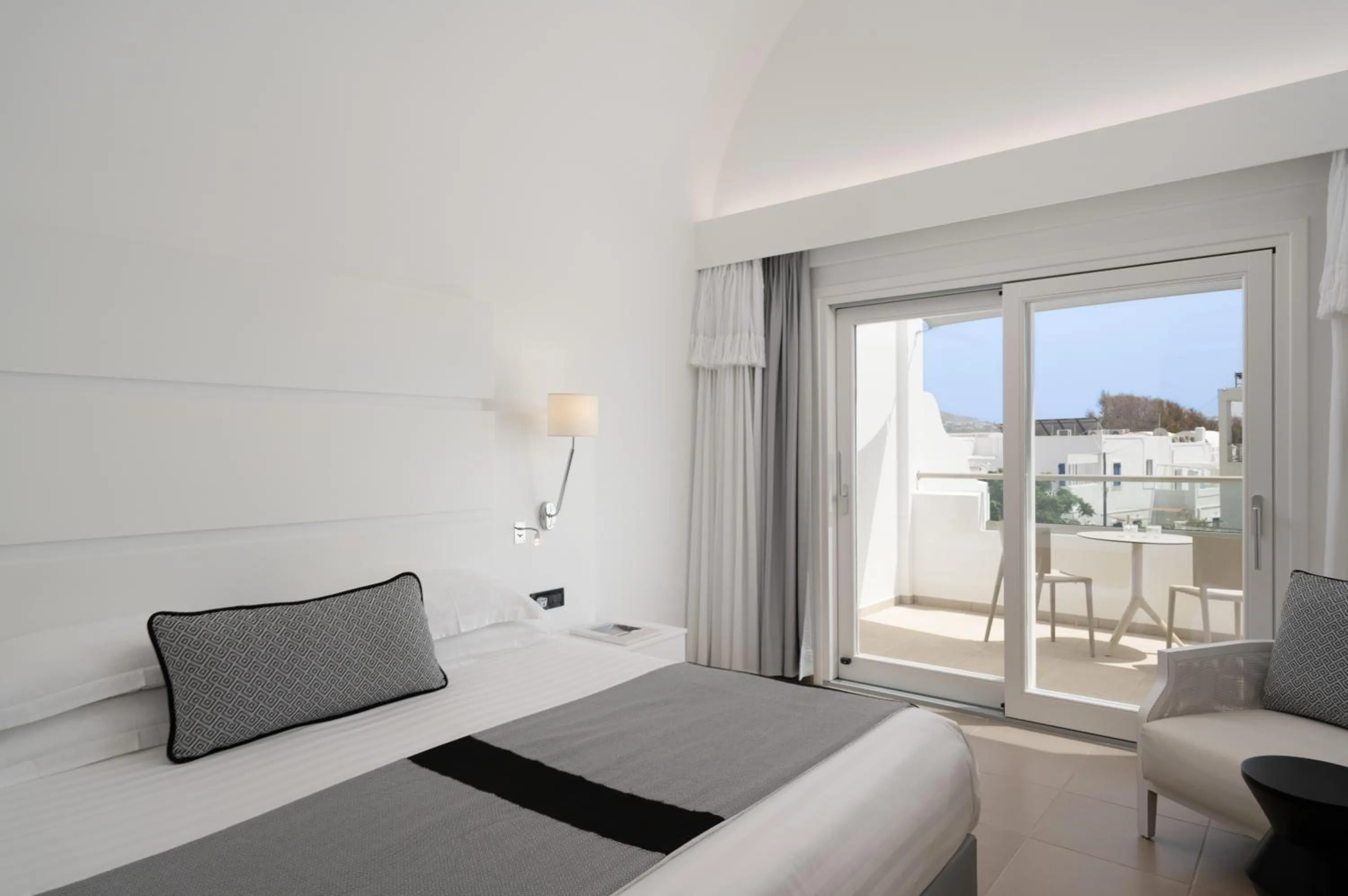 Bed in Aressana Spa Hotel & Suites - Small Luxury Hotels of the World