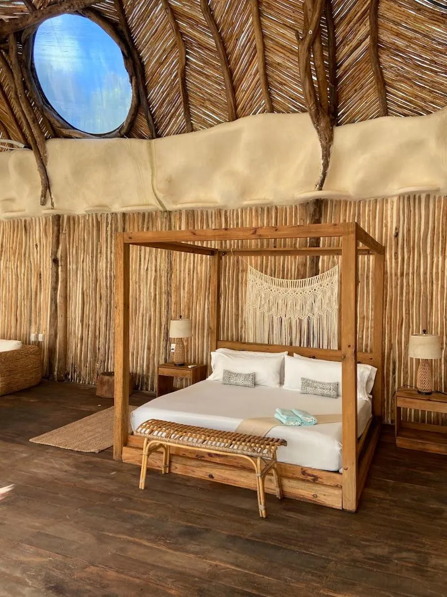 Bed in CervecerIa Tulum Boutique Hotel & Beer Spa