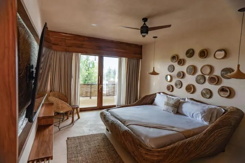 Bed in CervecerIa Tulum Boutique Hotel & Beer Spa