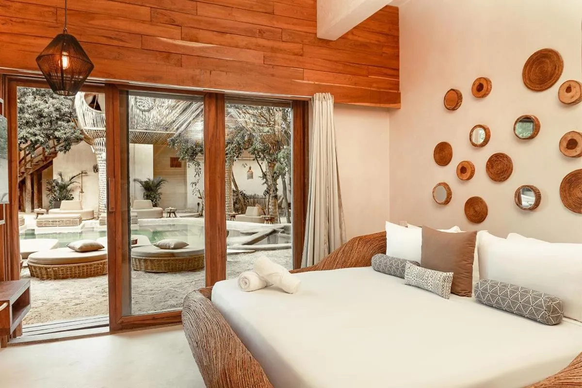 Bed in CervecerIa Tulum Boutique Hotel & Beer Spa
