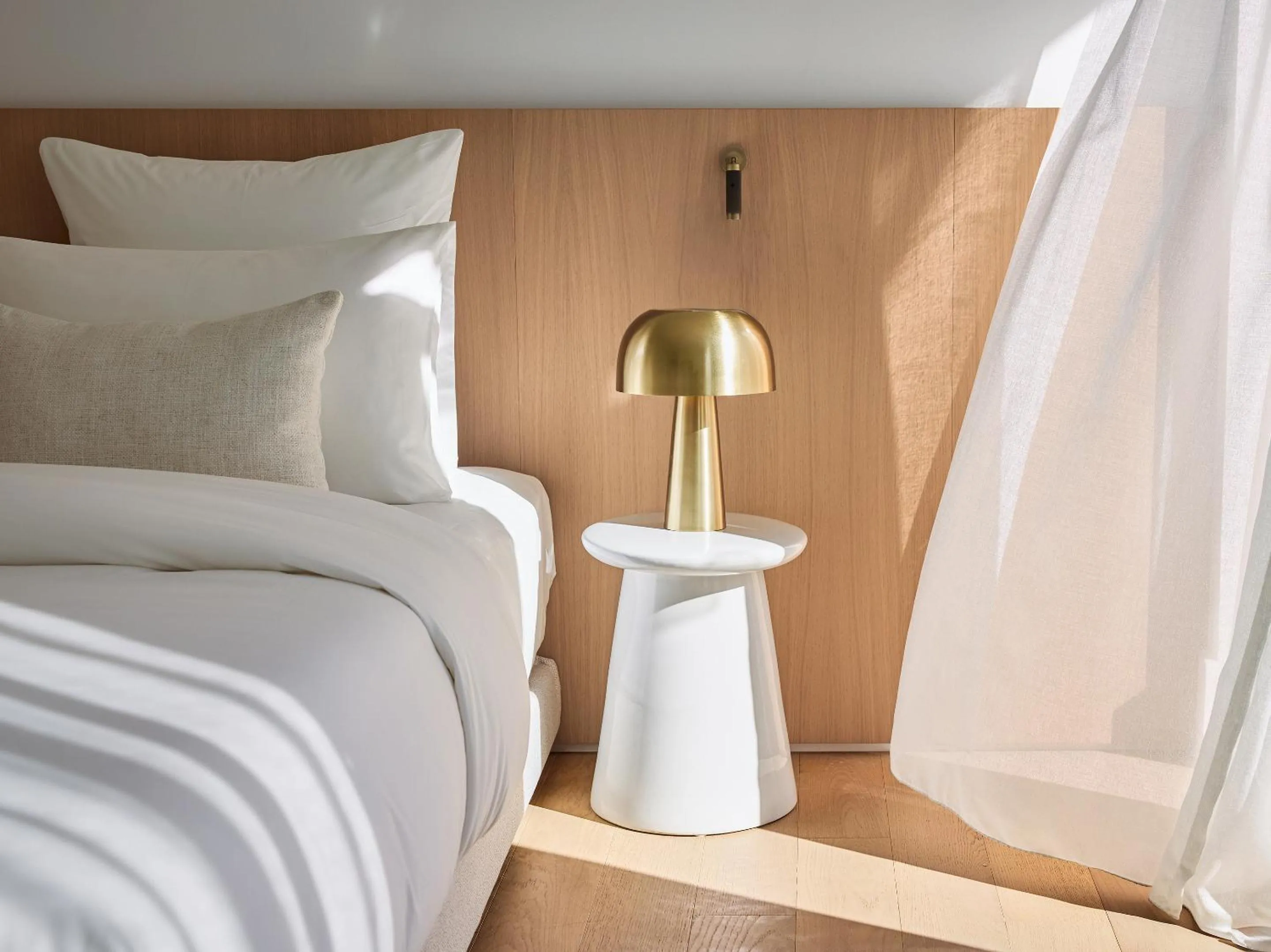 Bed in Vouliagmeni Suites