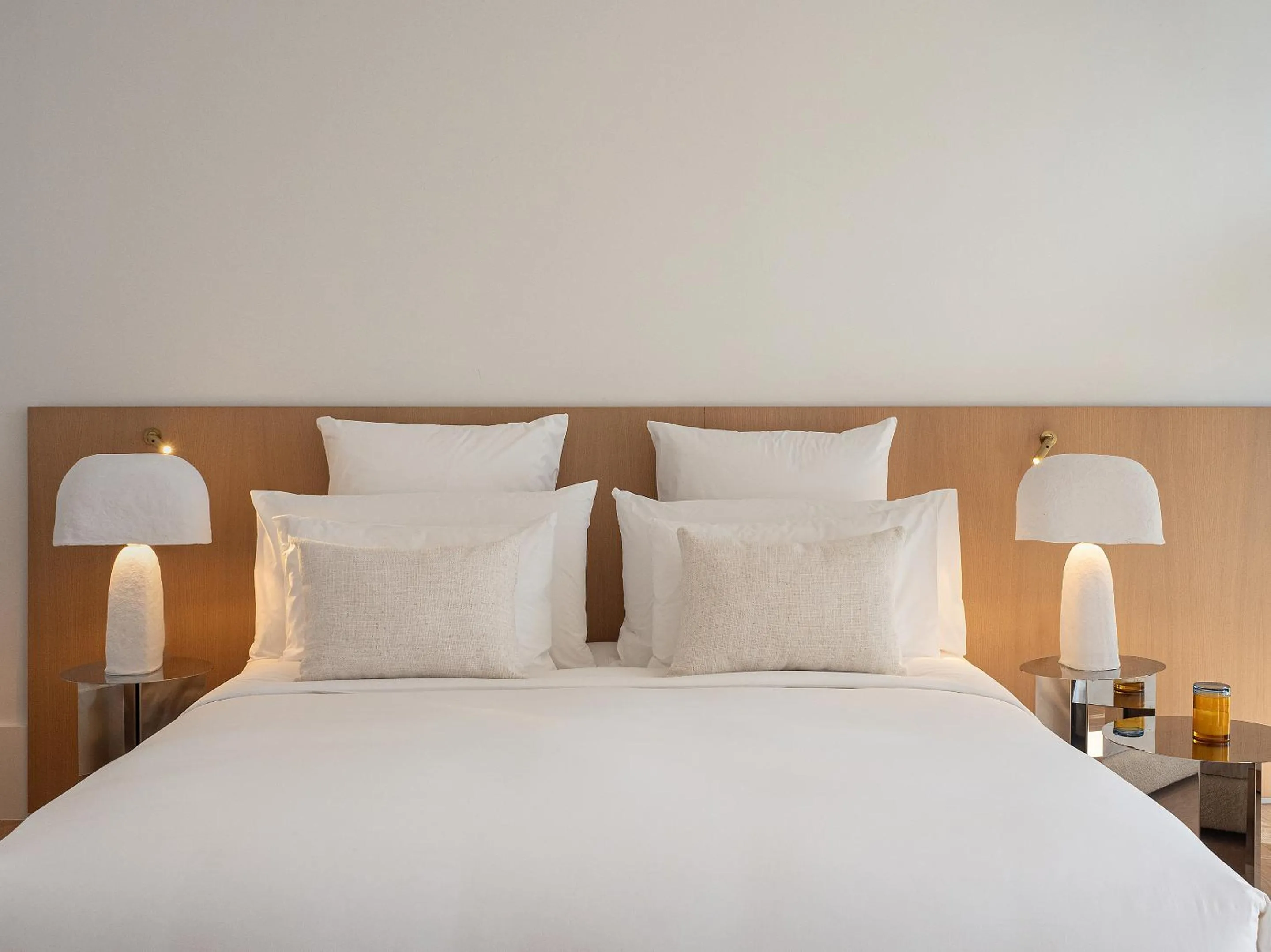 Bed in Vouliagmeni Suites