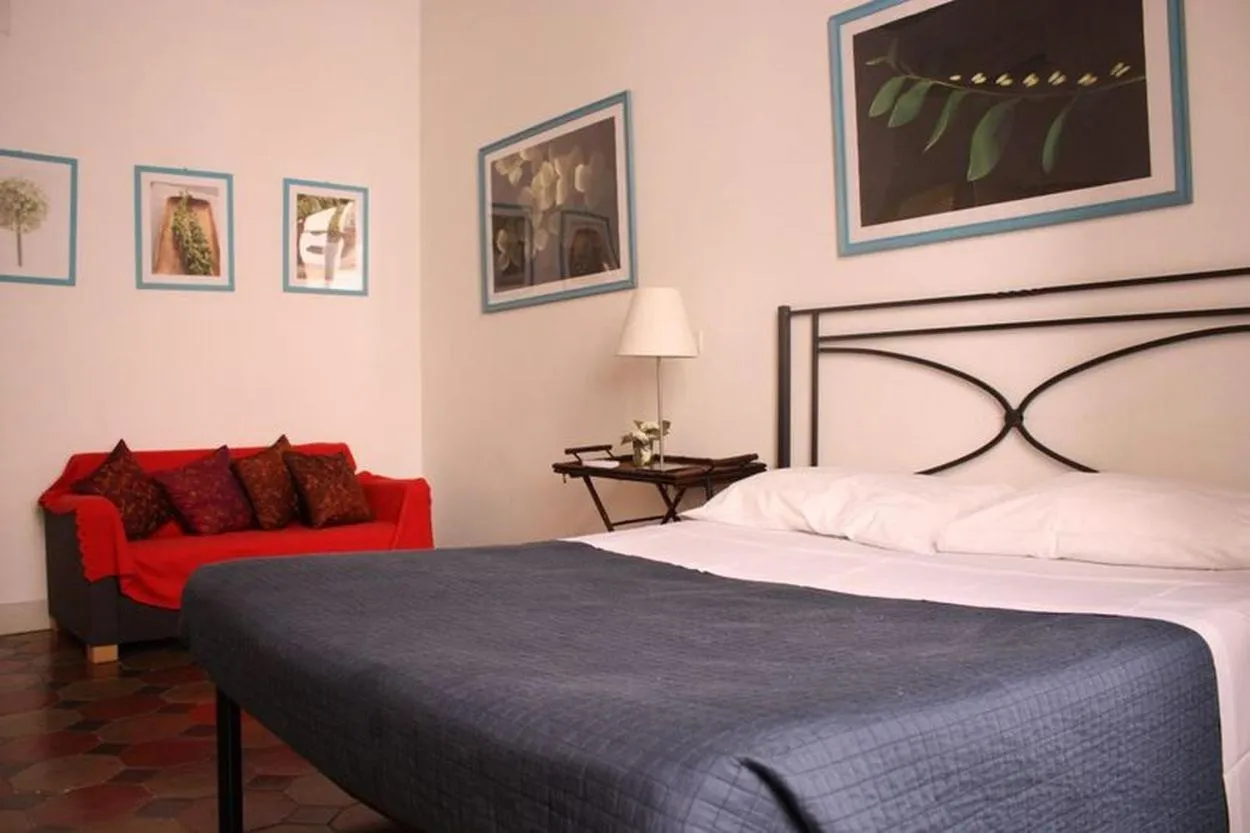 Bed in Ara Pacis Navona Apartments