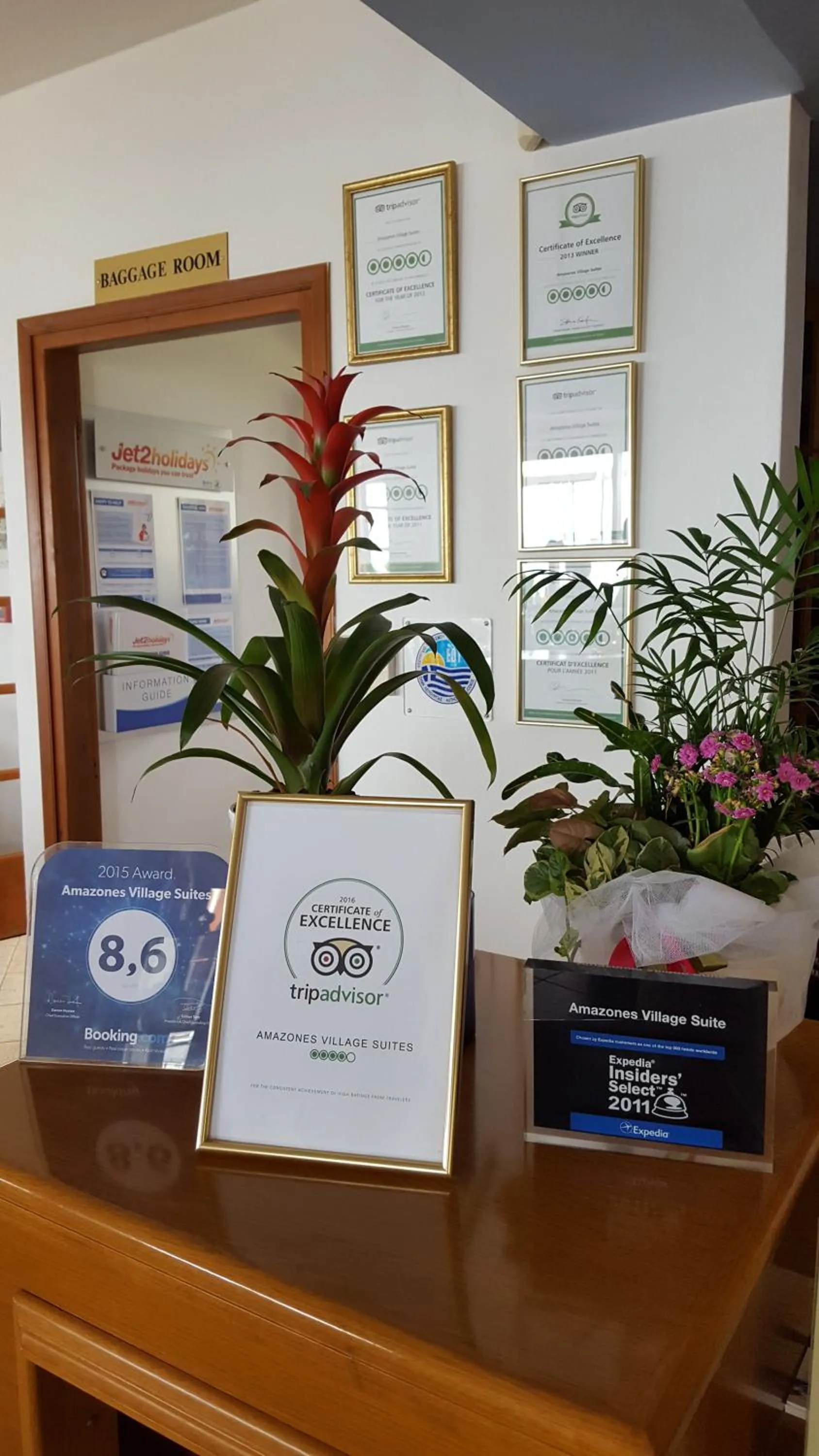 Property logo or sign in Amazones Village Suites