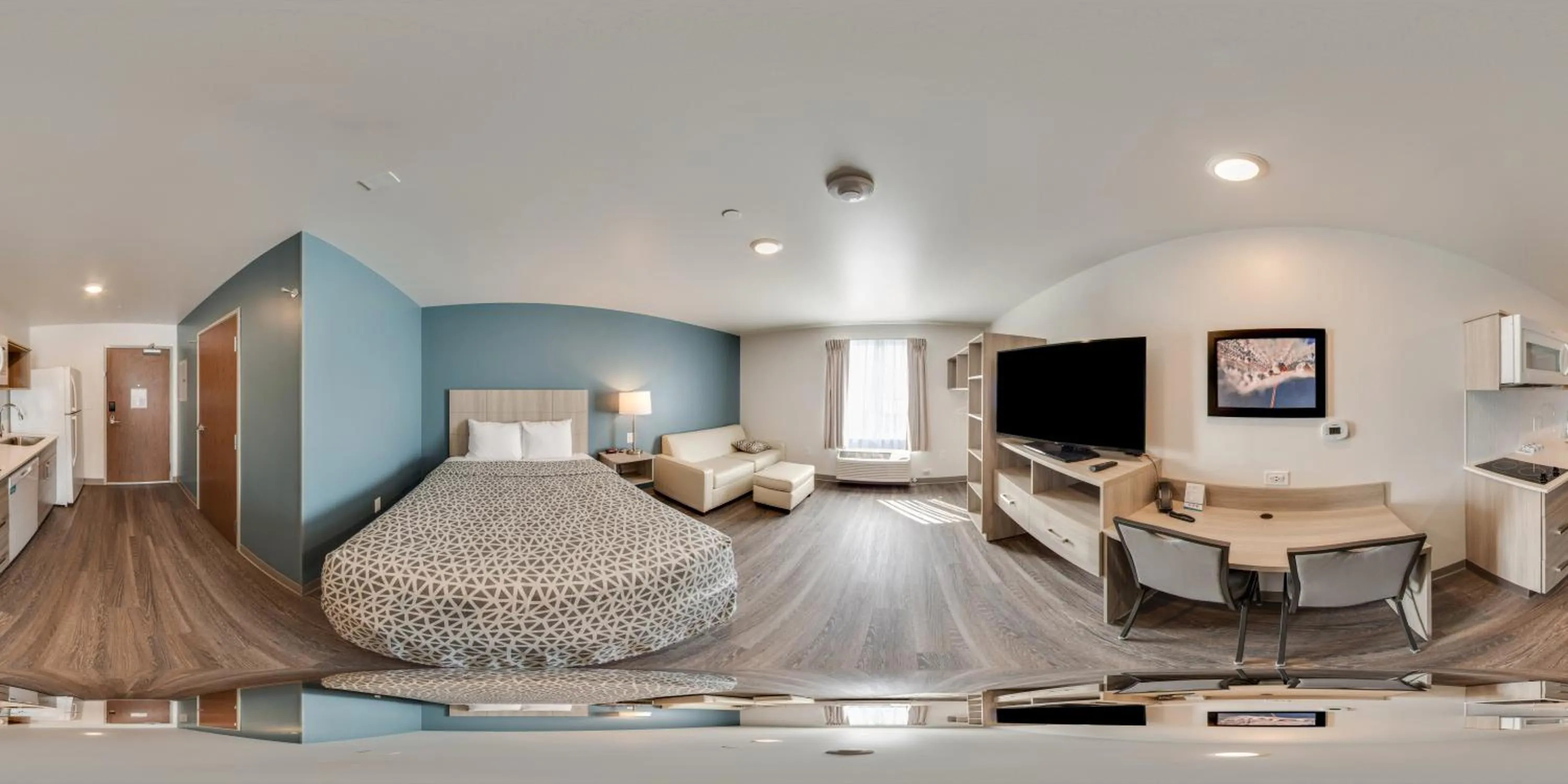 Photo of the whole room, Bed in WoodSpring Suites Grand Rapids Kentwood