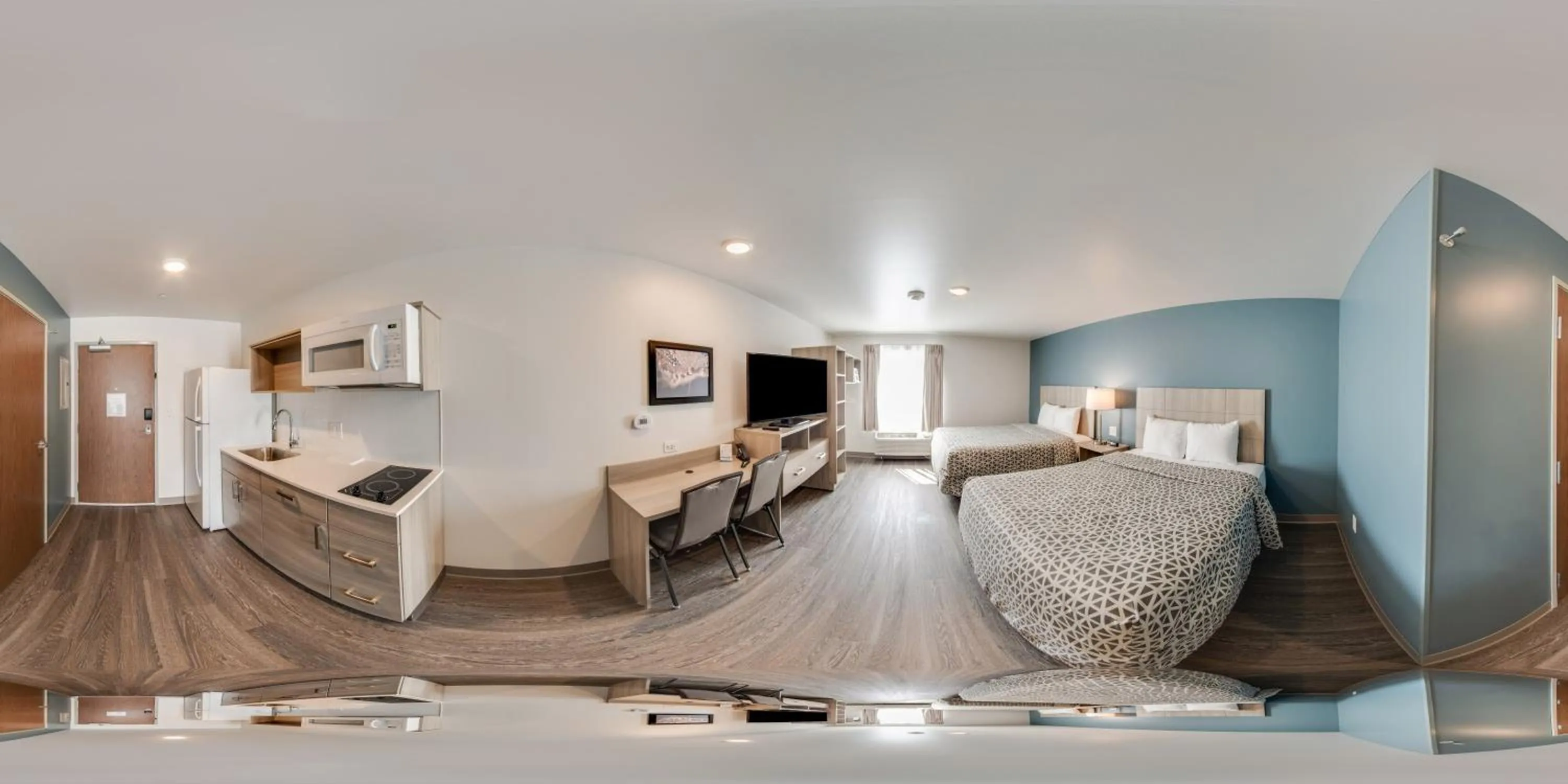 Photo of the whole room, Bed in WoodSpring Suites Grand Rapids Kentwood