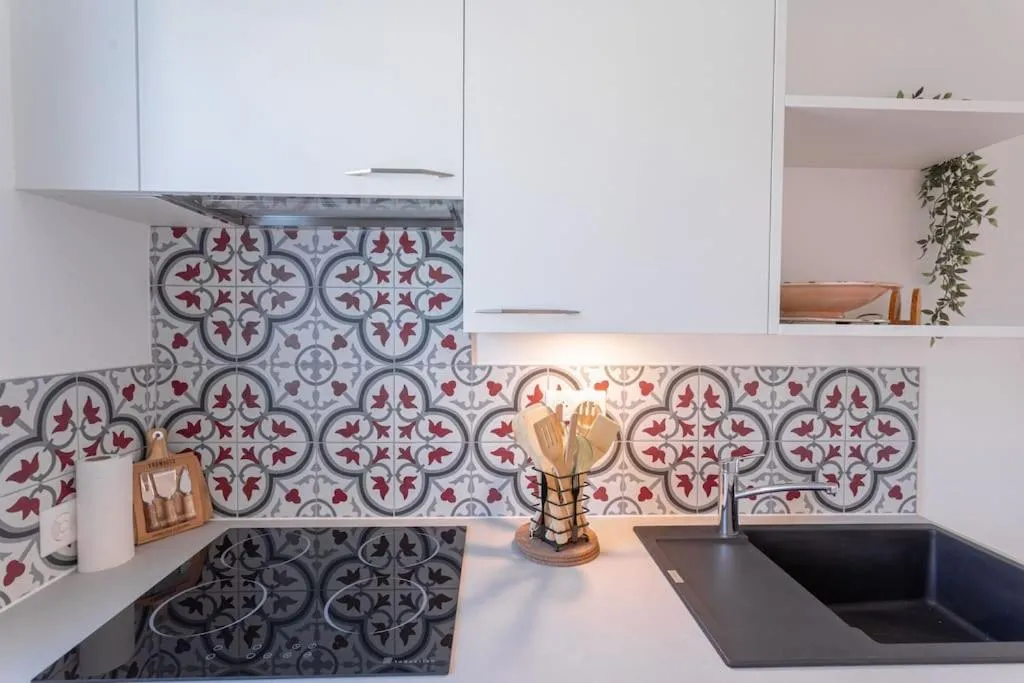 Kitchen or kitchenette in Apartment With Panoramic Sea View, Walk To The Beach - Maréchal Juin by Halldis