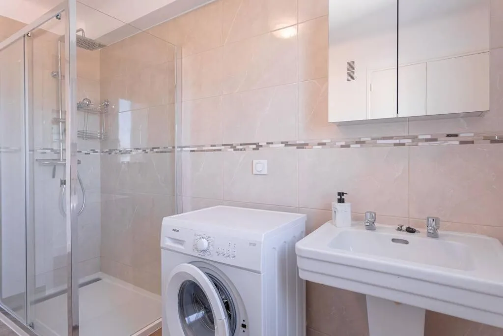 Shower in Apartment With Panoramic Sea View, Walk To The Beach - Maréchal Juin by Halldis
