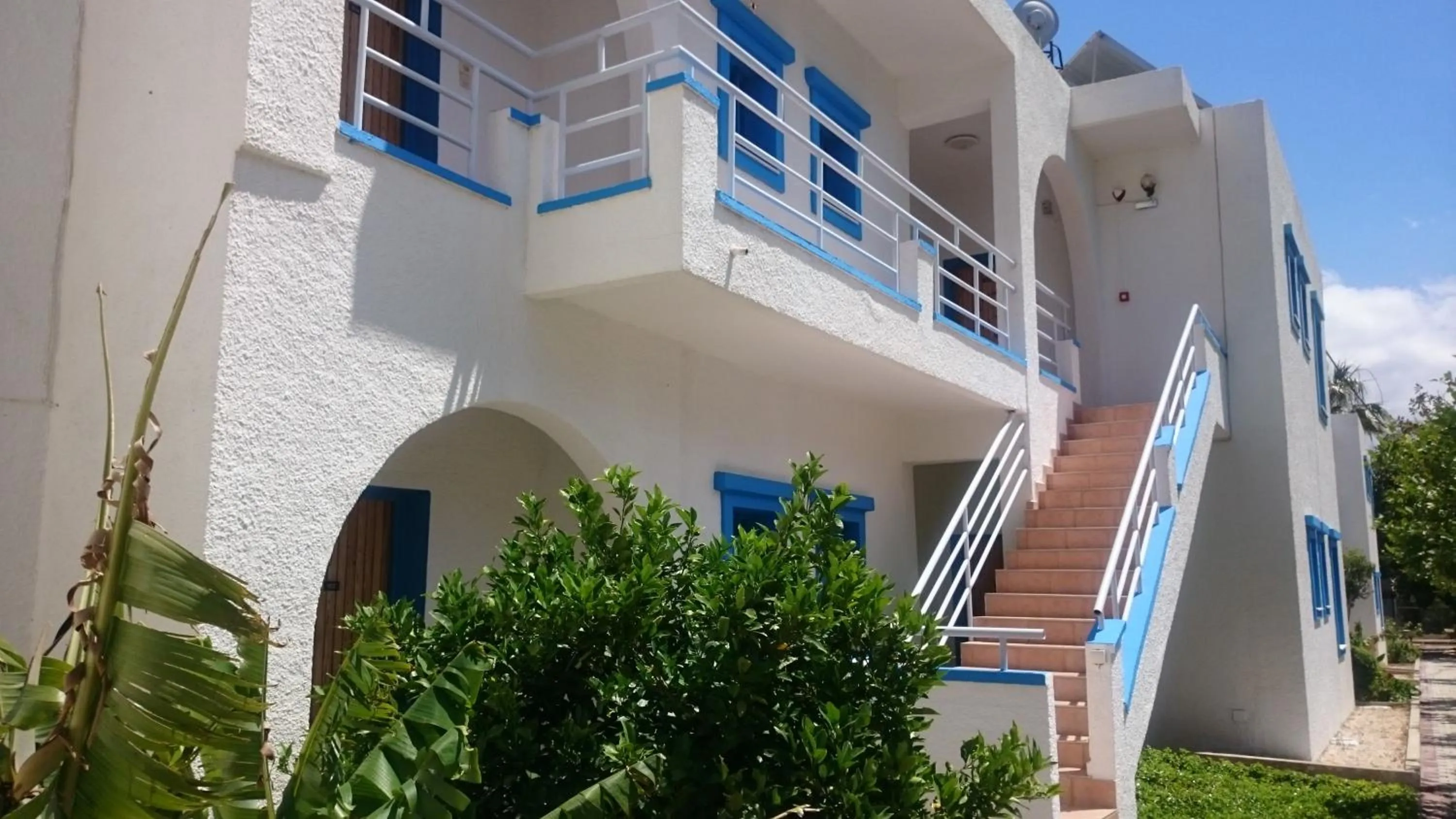 Facade/entrance in Amazones Villas Apartments