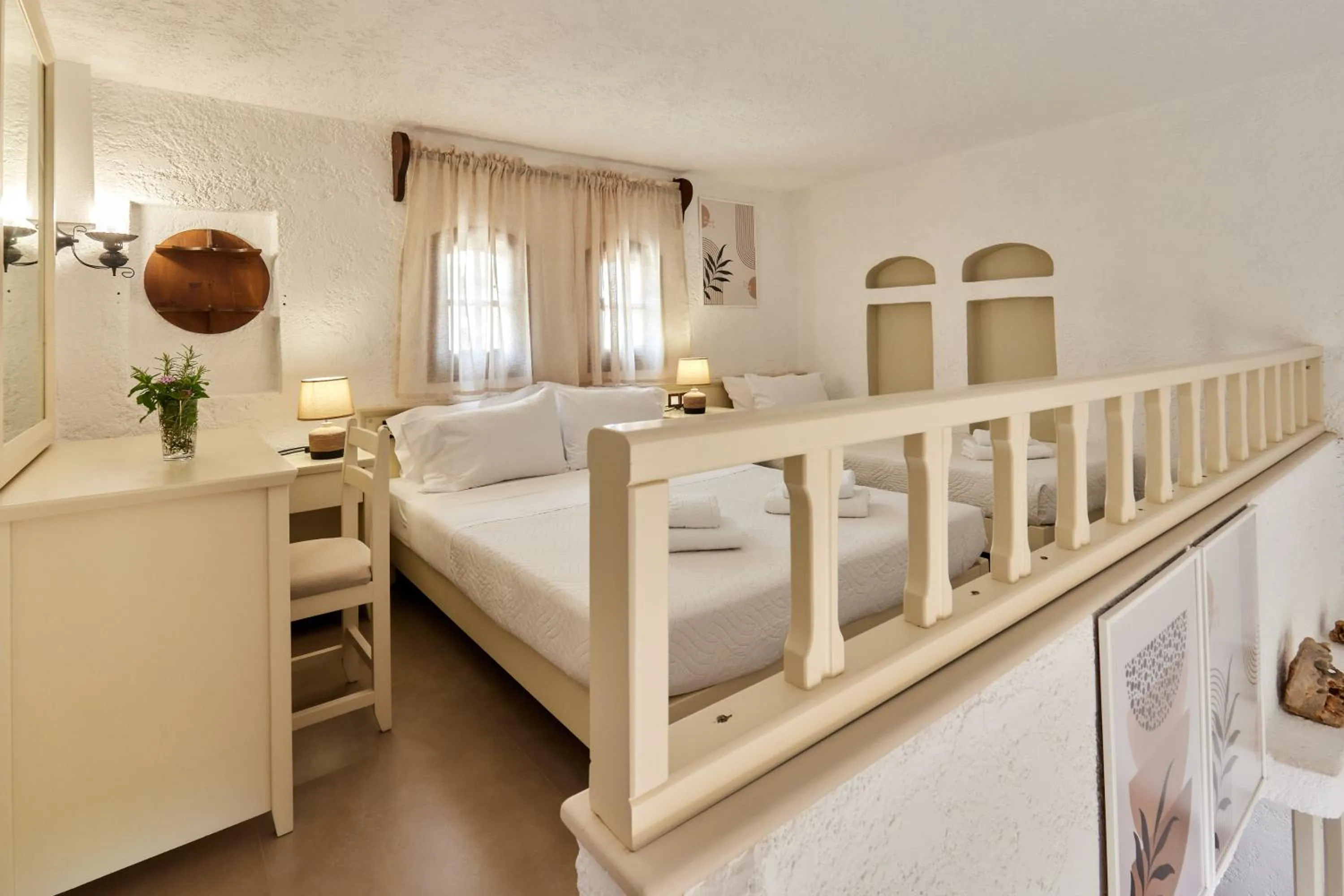 Bed in Mila Malia Studios Hotel