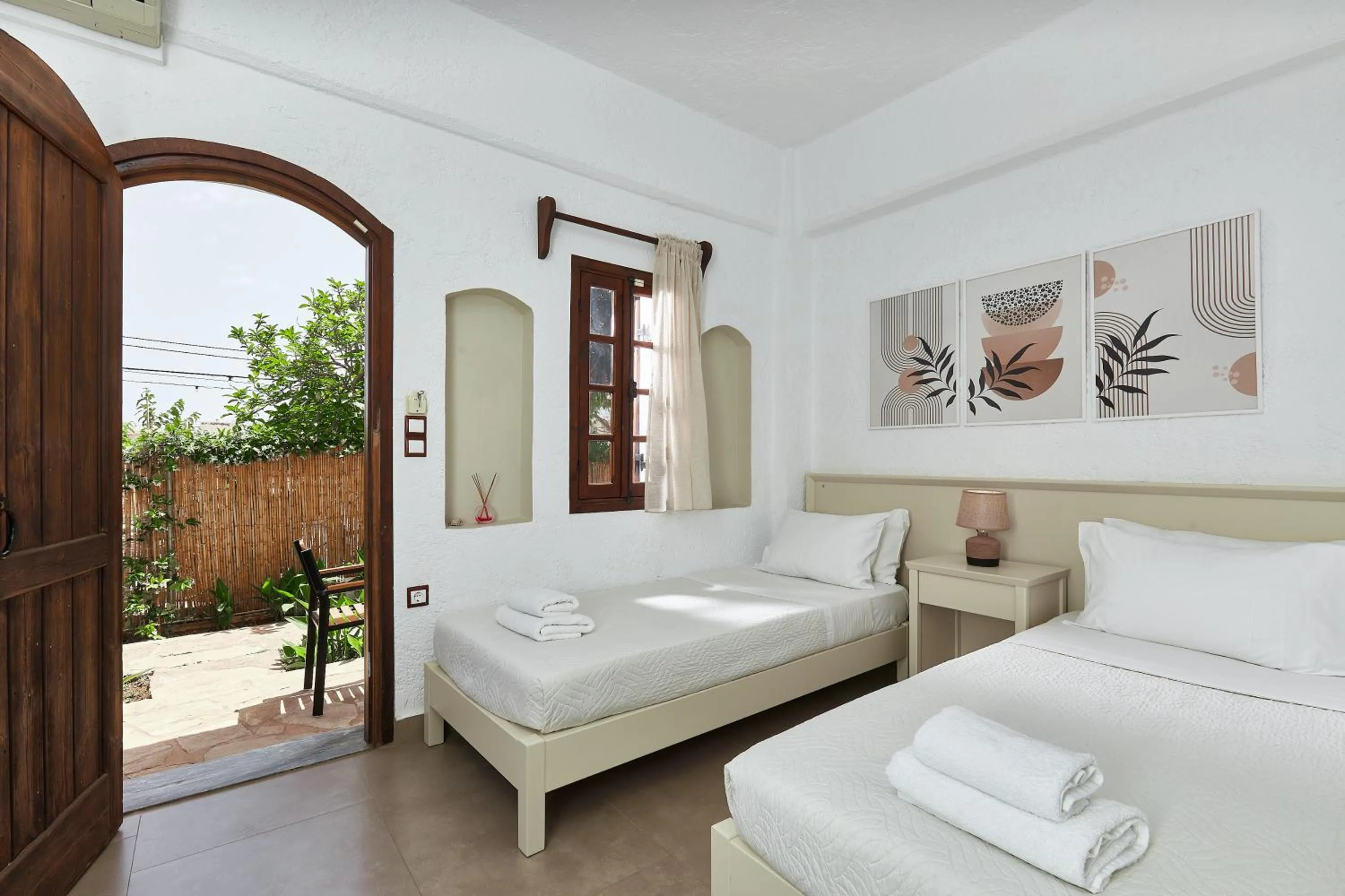 Bed in Mila Malia Studios Hotel