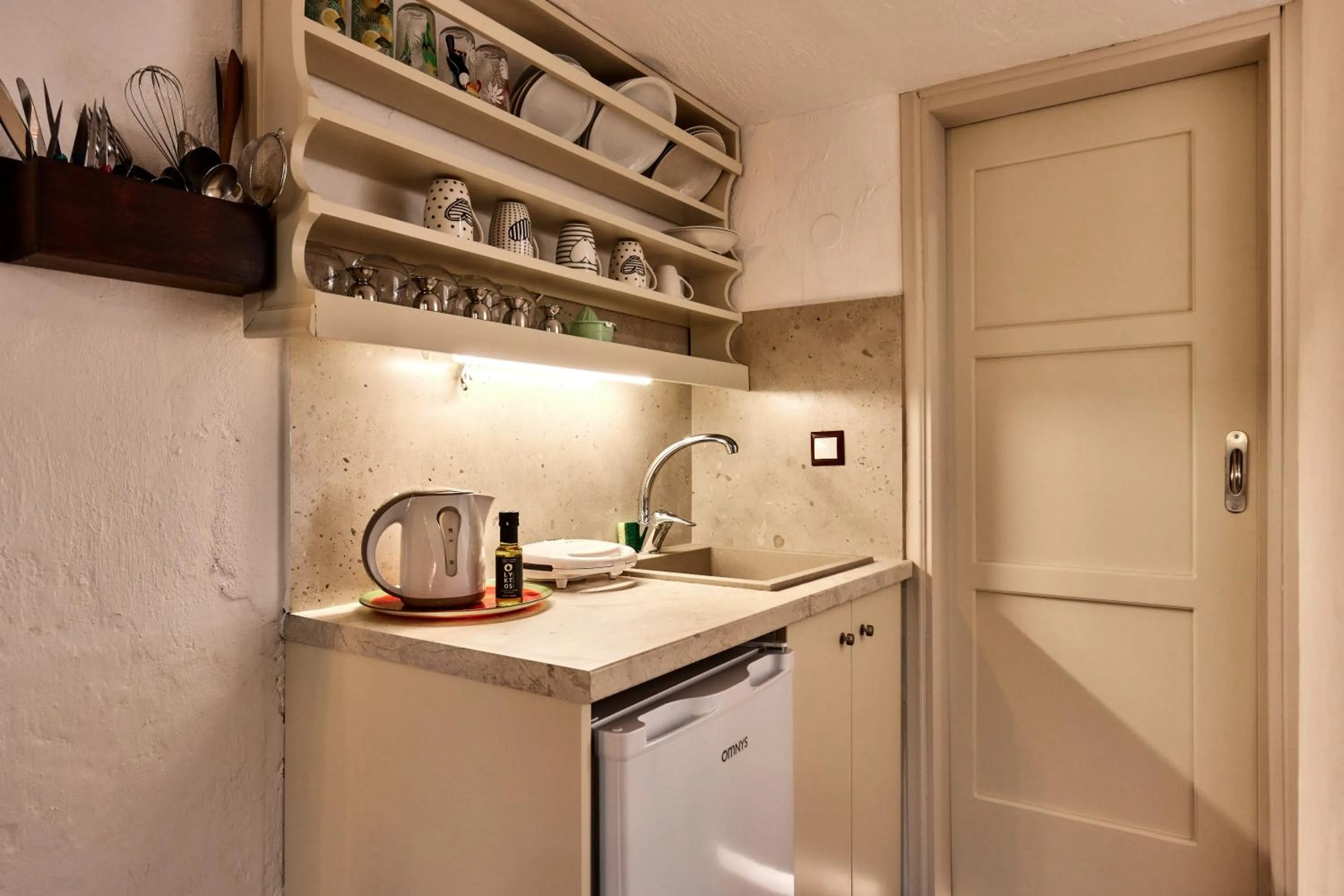 kitchen in Mila Malia Studios Hotel