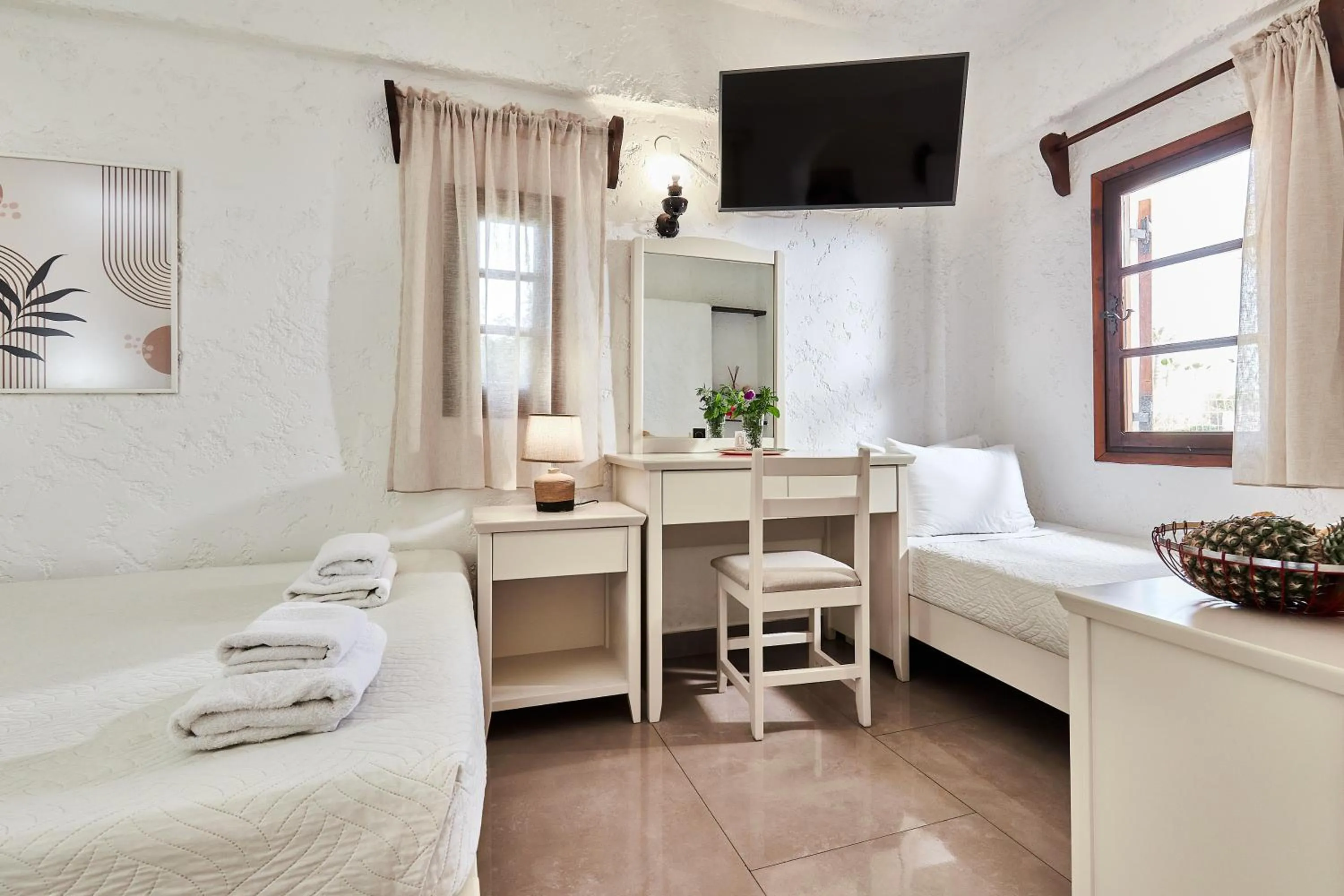 Bed in Mila Malia Studios Hotel