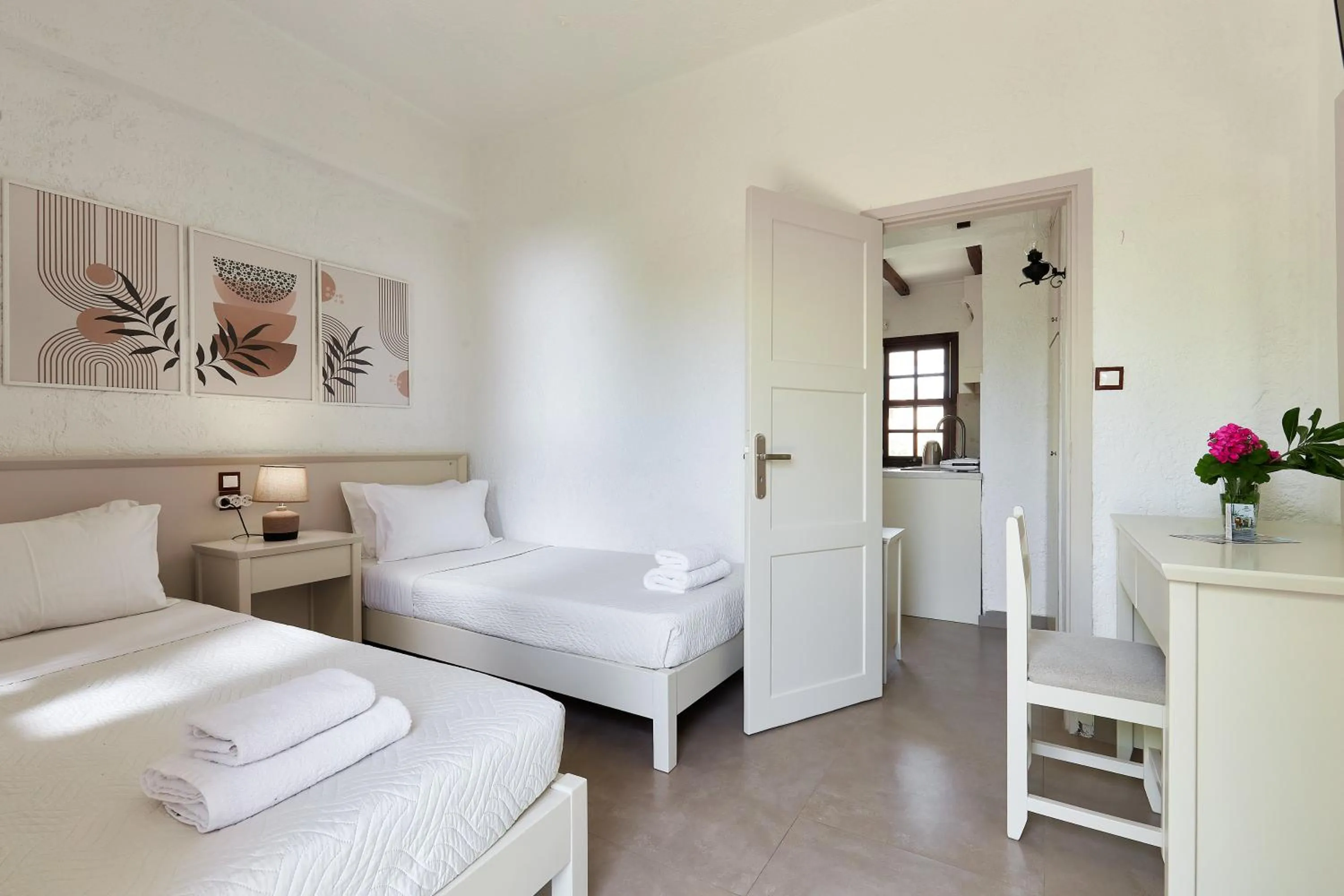 Bed in Mila Malia Studios Hotel