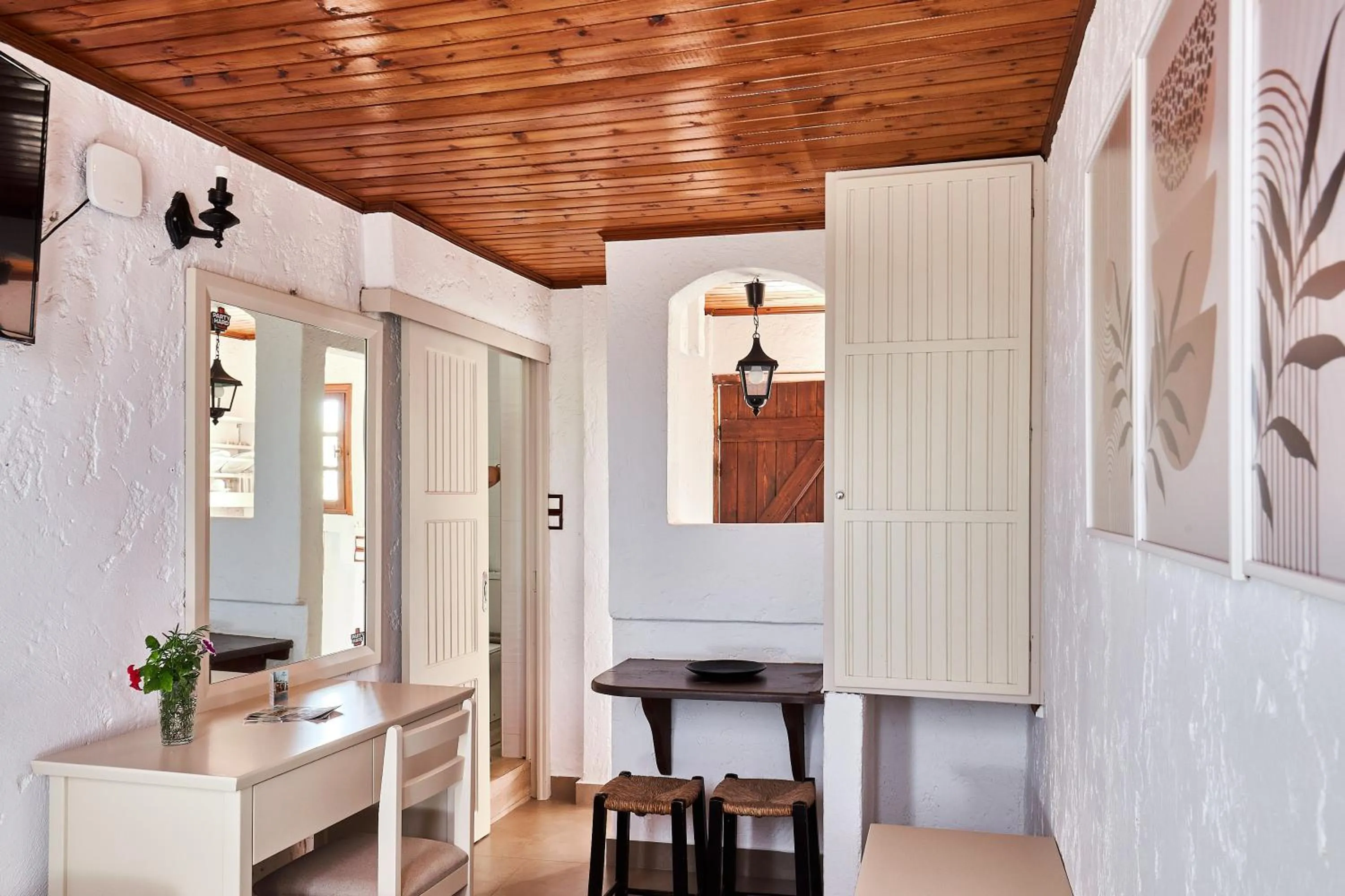 Bed in Mila Malia Studios Hotel