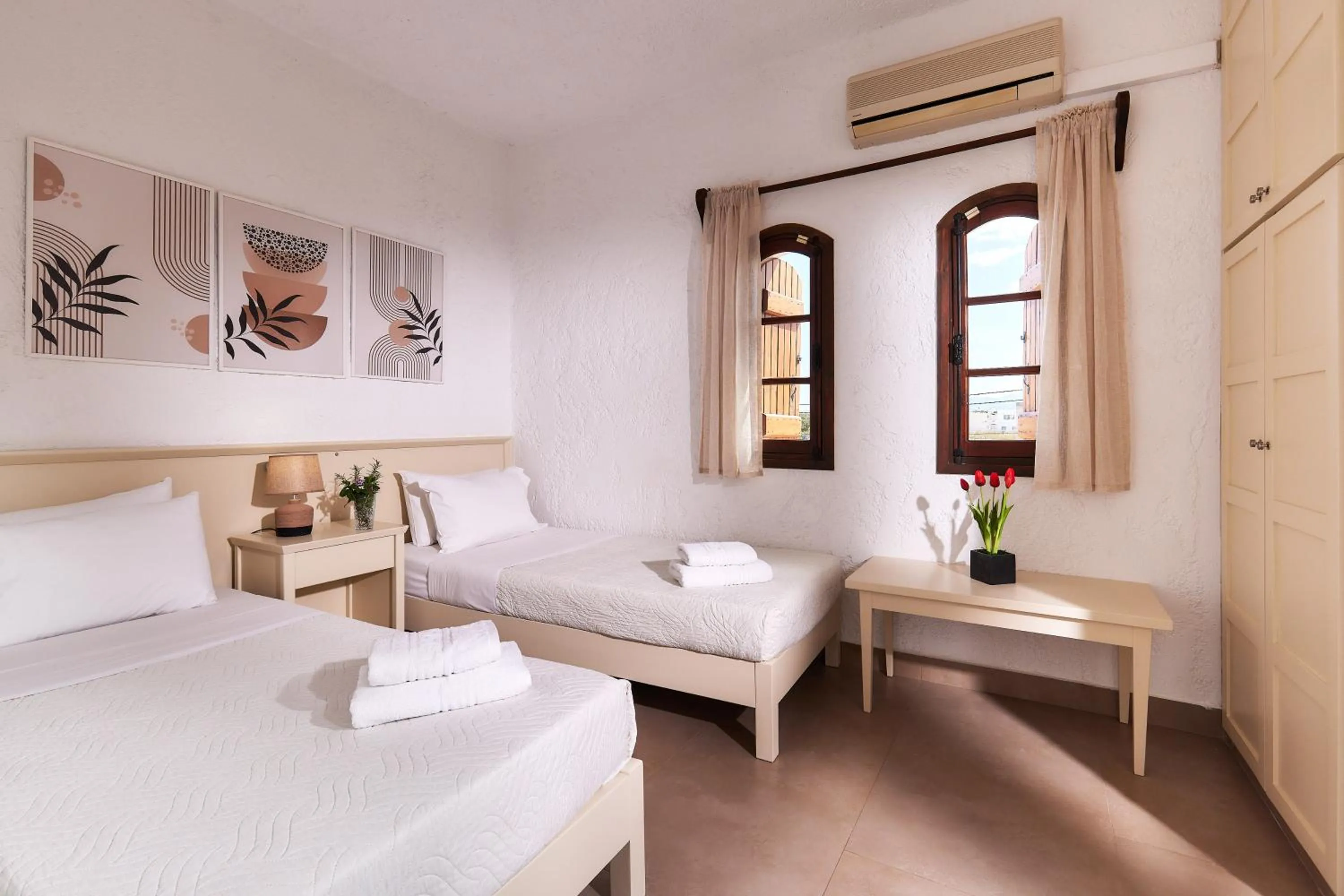 Bed in Mila Malia Studios Hotel