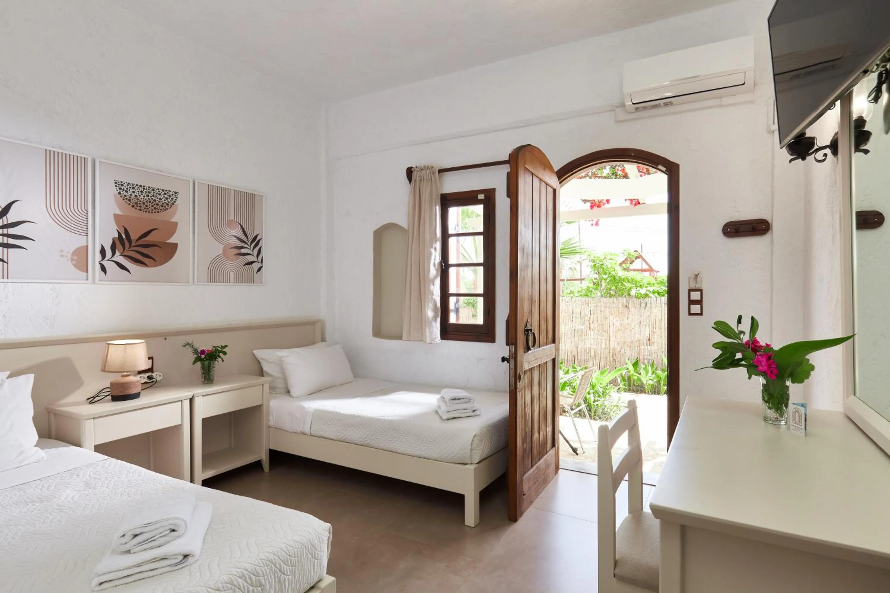 Bed in Mila Malia Studios Hotel