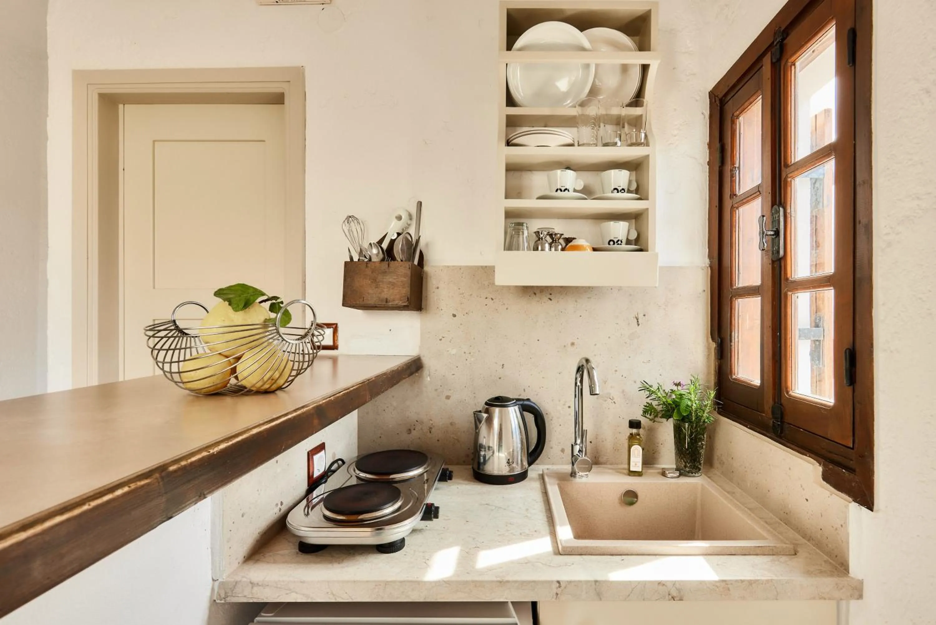 kitchen in Mila Malia Studios Hotel