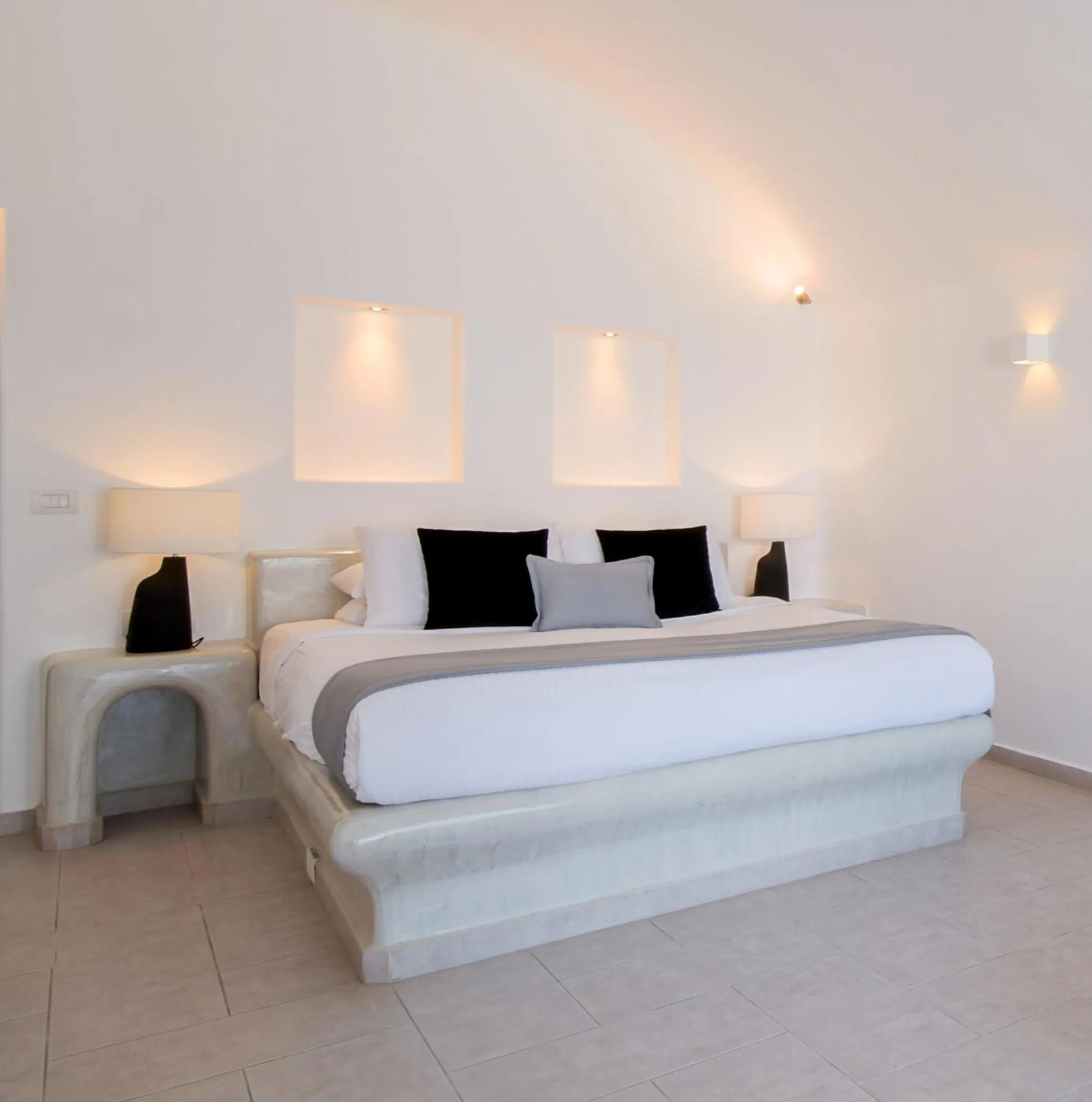 Bed in Pegasus Suites & Spa