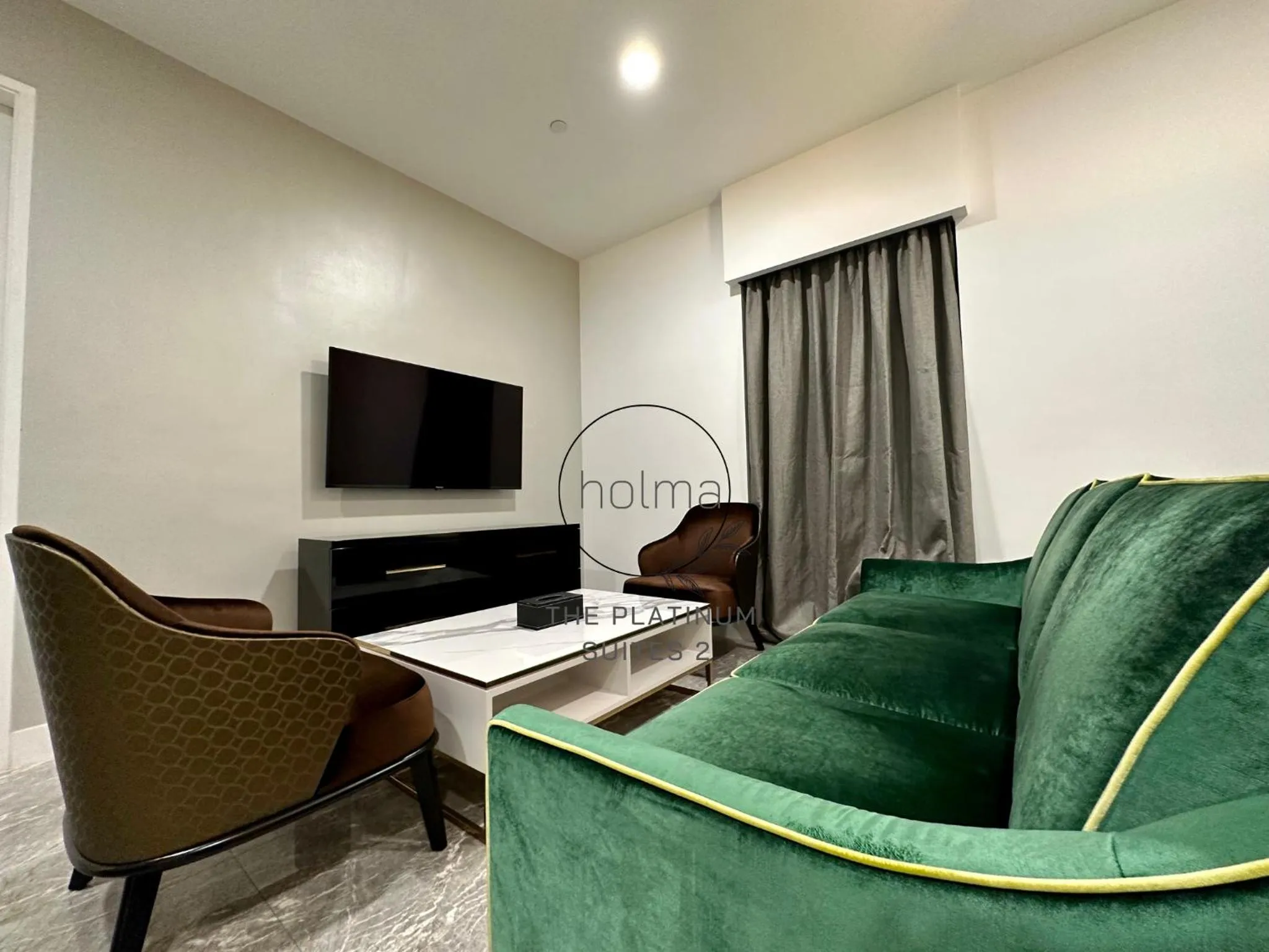 Living room in The Platinum 2 Kuala Lumpur by HOLMA