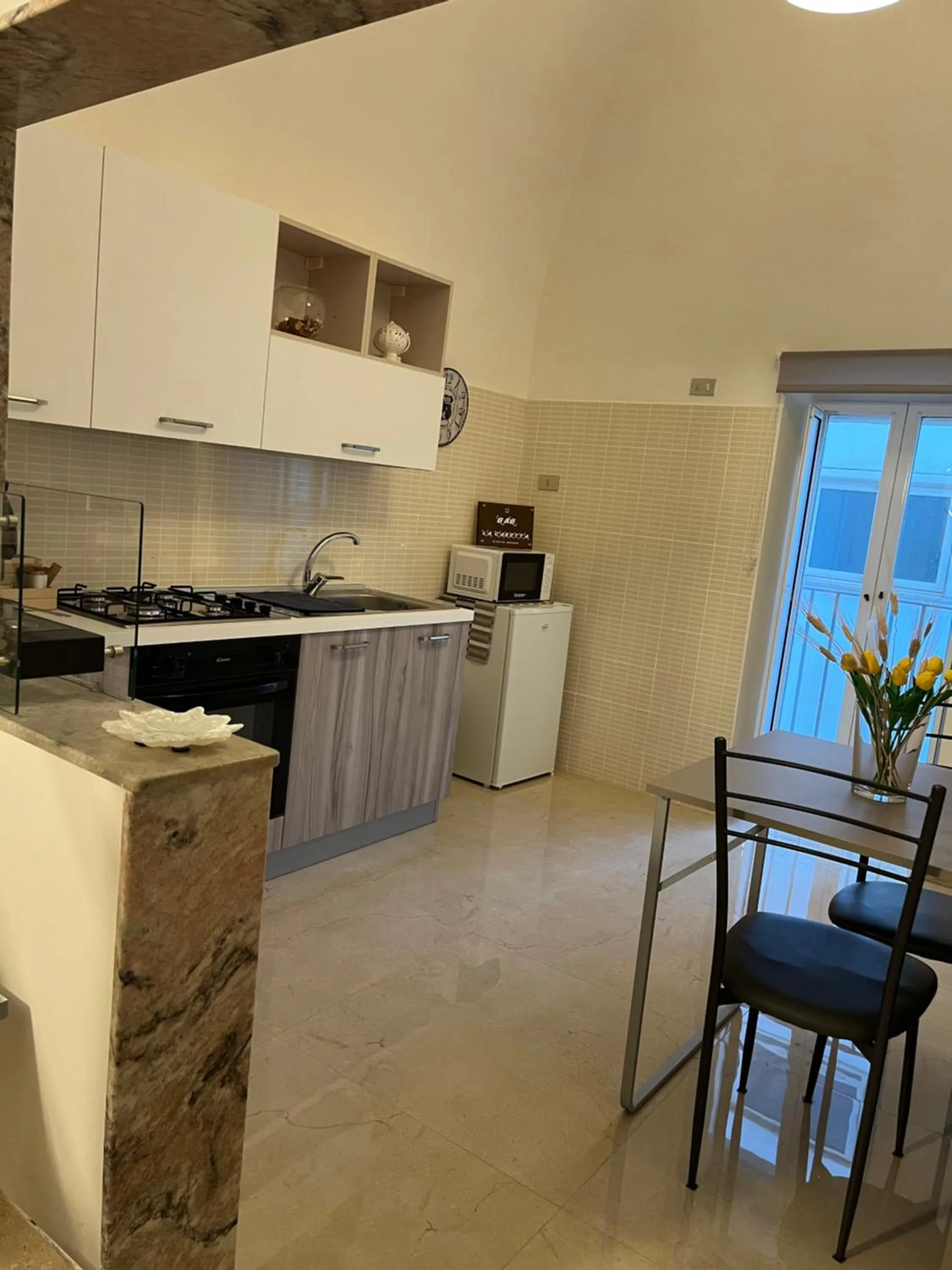 Kitchen/Kitchenette in B&B LA CASETTA