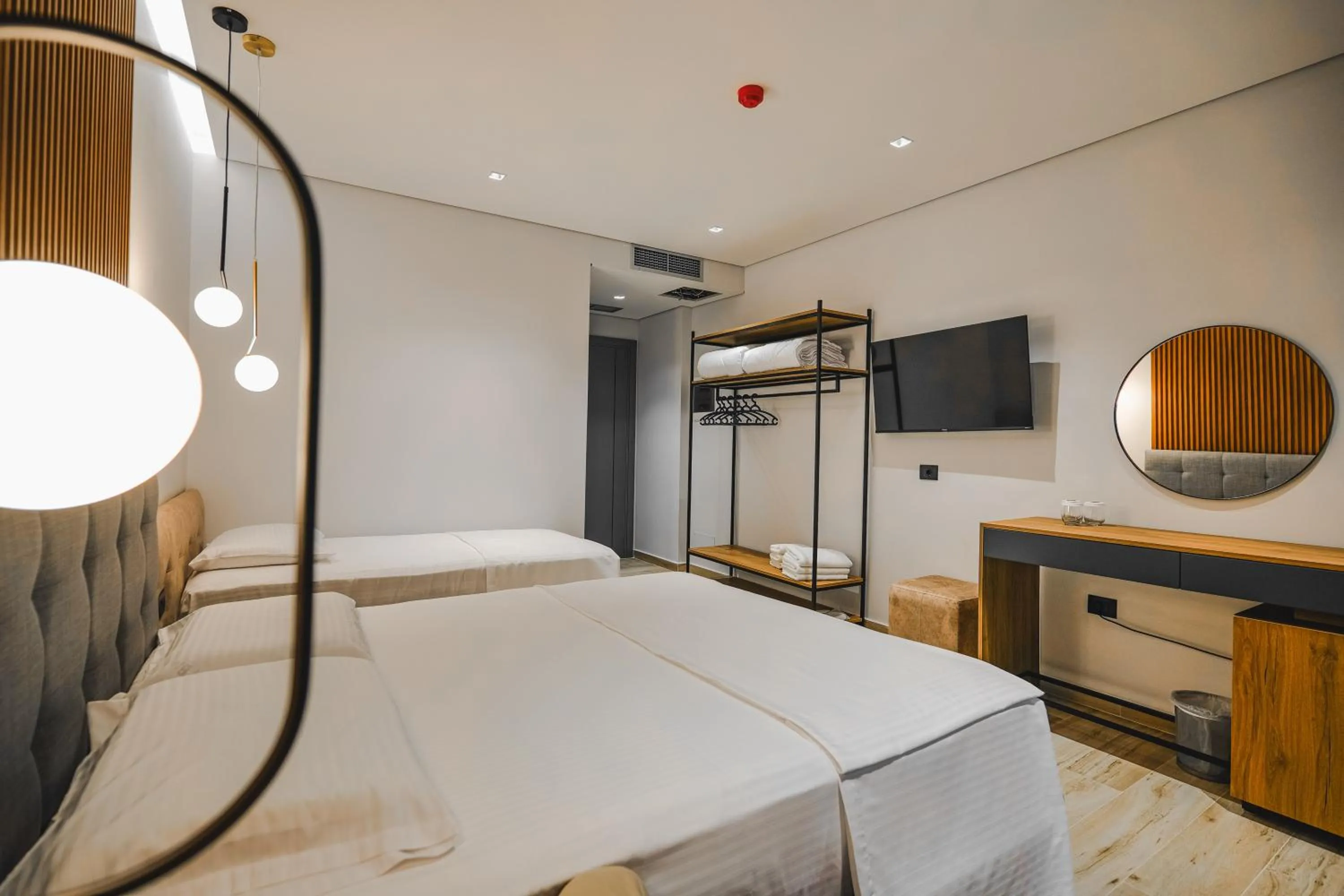 Communal lounge/ TV room, Bed in Ori Mare Hotel