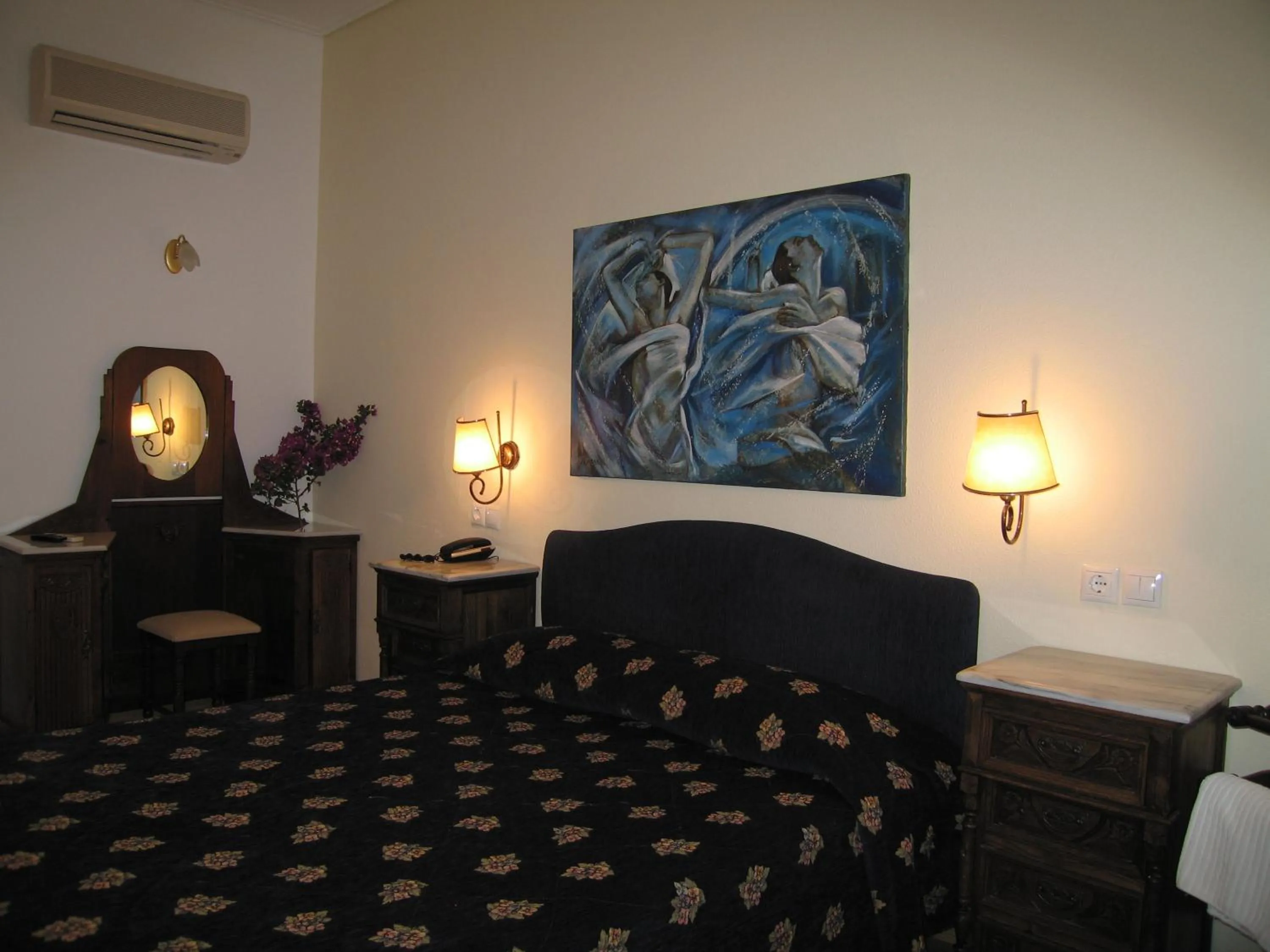 Bed in Mistral Hotel