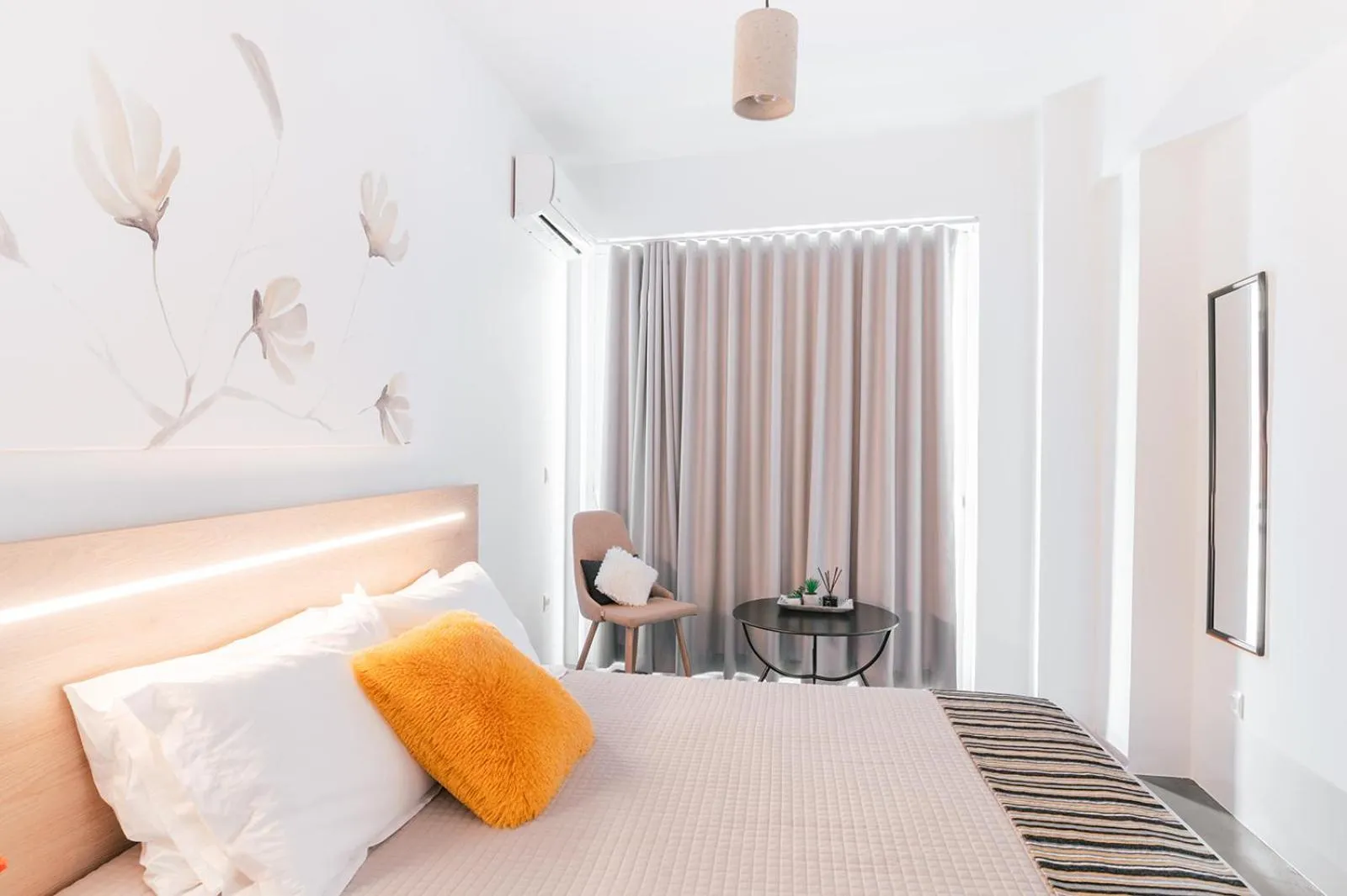 Bed in MAGNOLIA SUITES