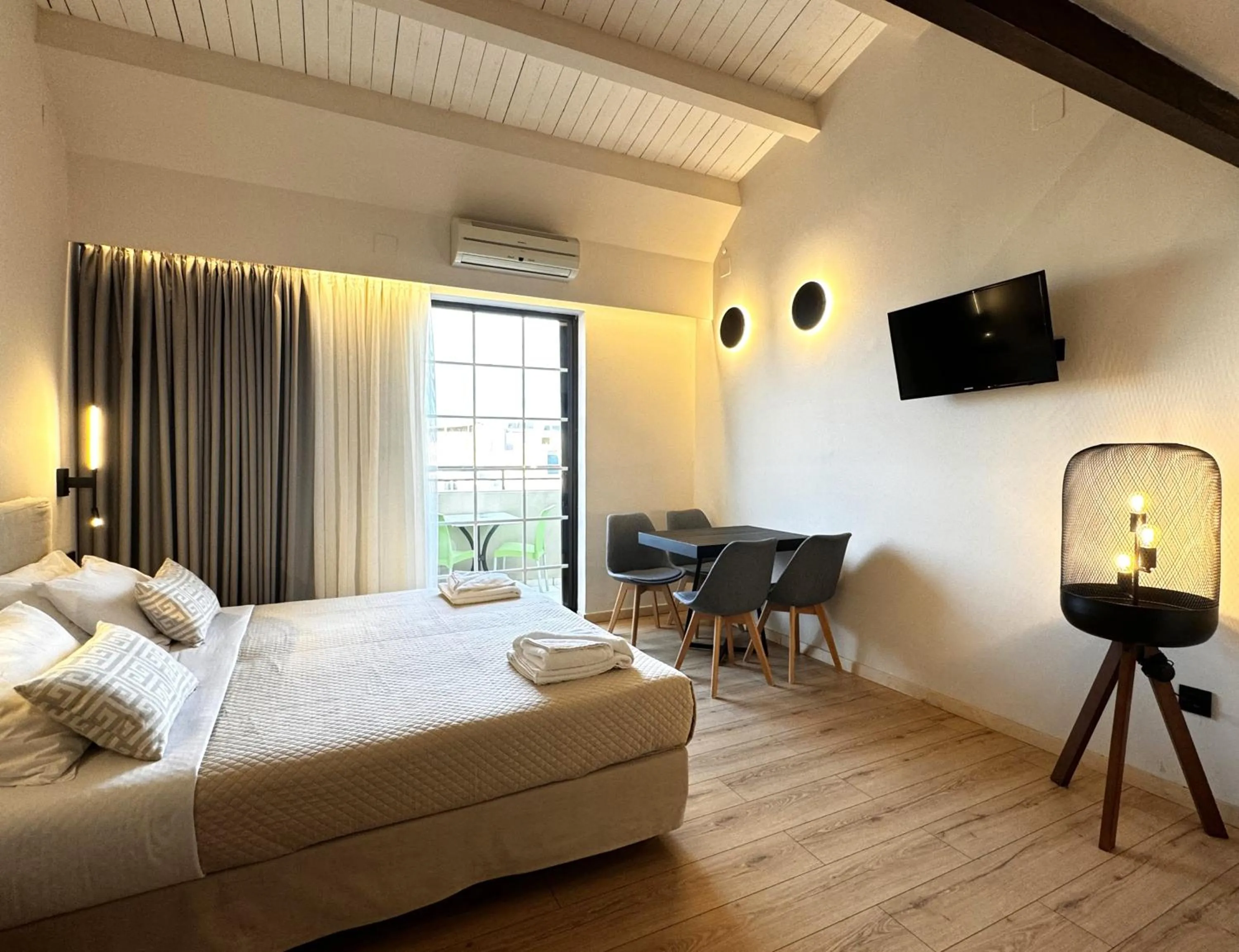 Bed in Elina Hotel Apartments