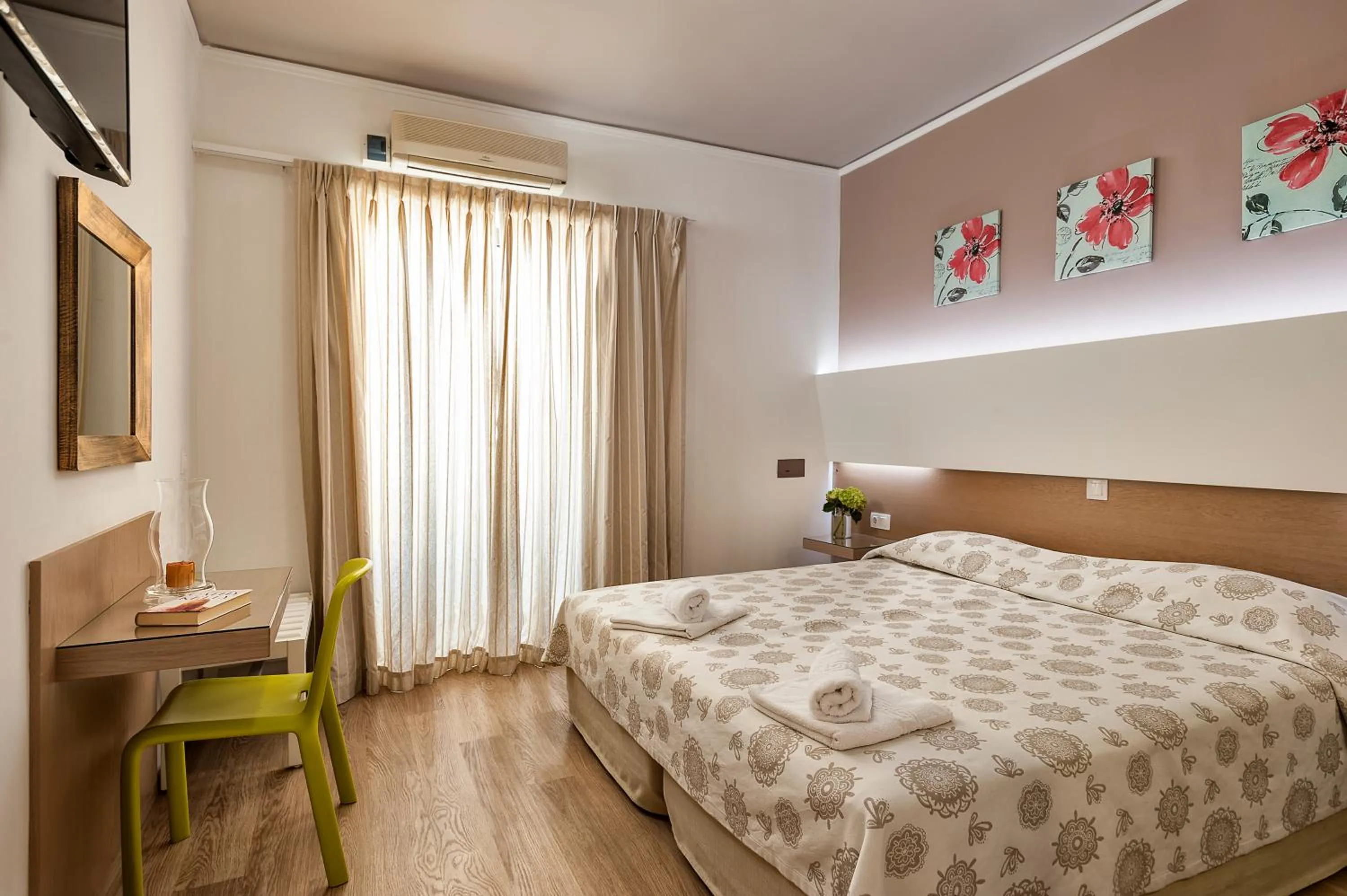Bed in Elina Hotel Apartments