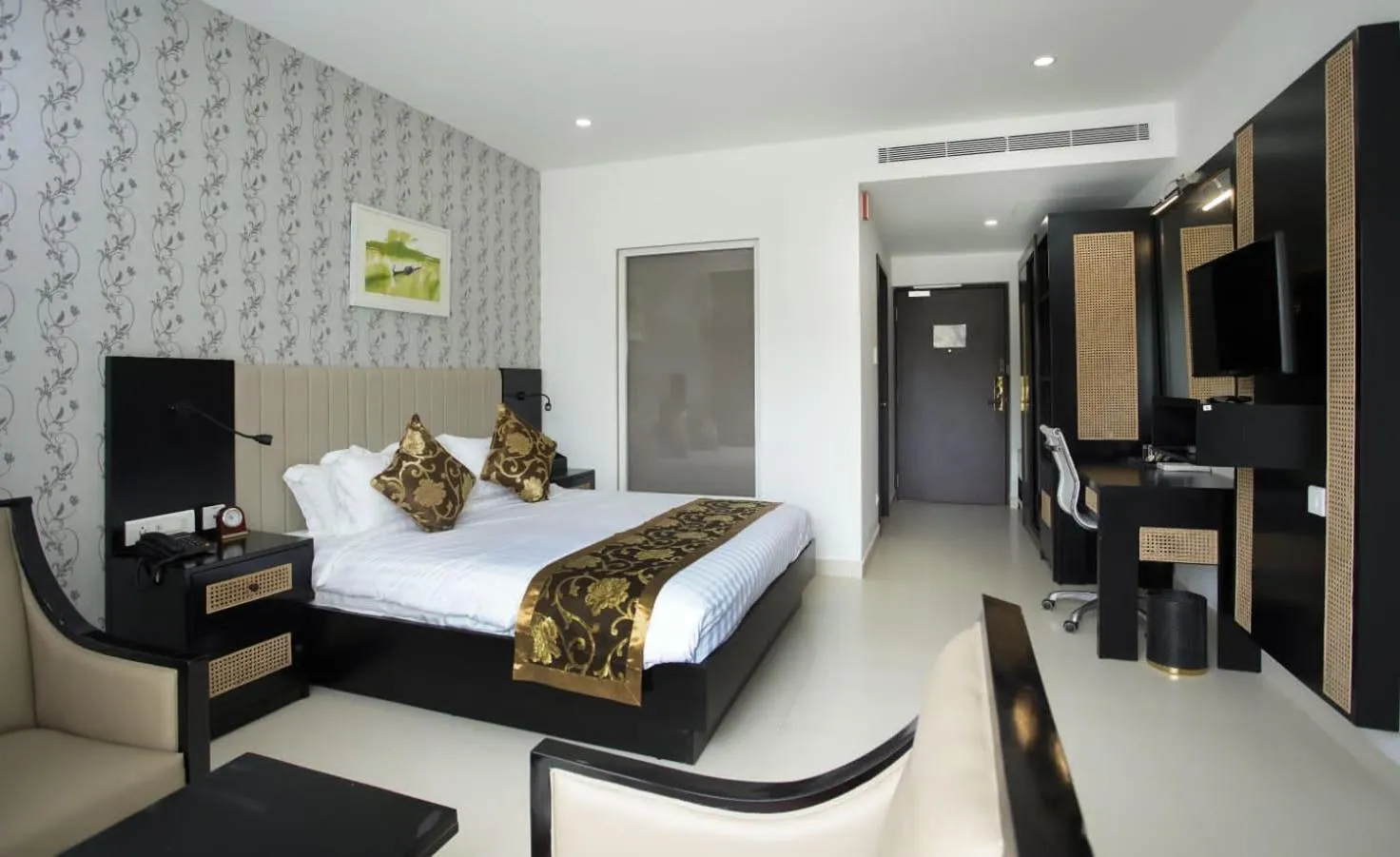 Bed in MARIYALAYAM MUNROE ISLAND RESIDENCY