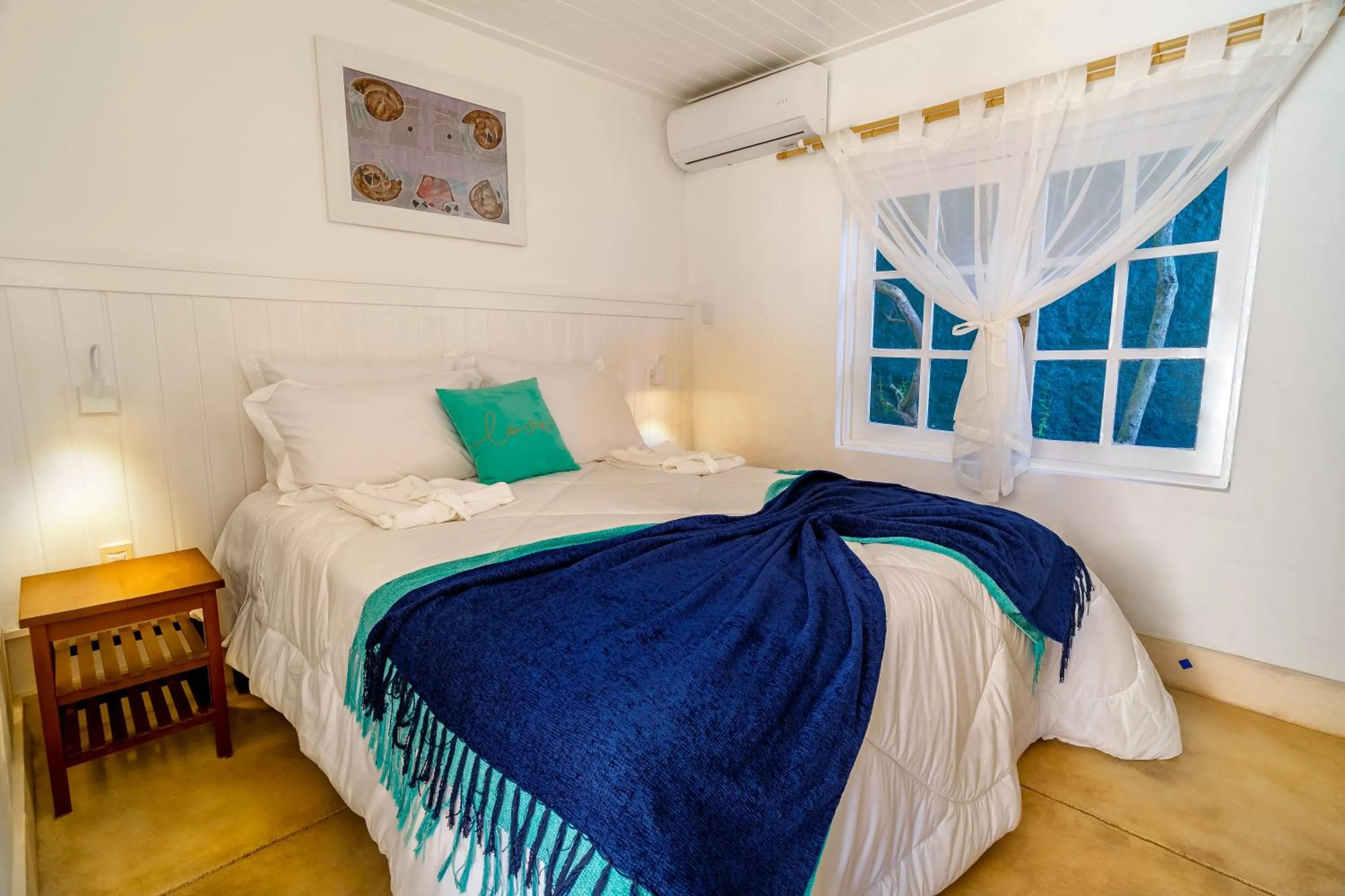 Bed in Pousada Maré