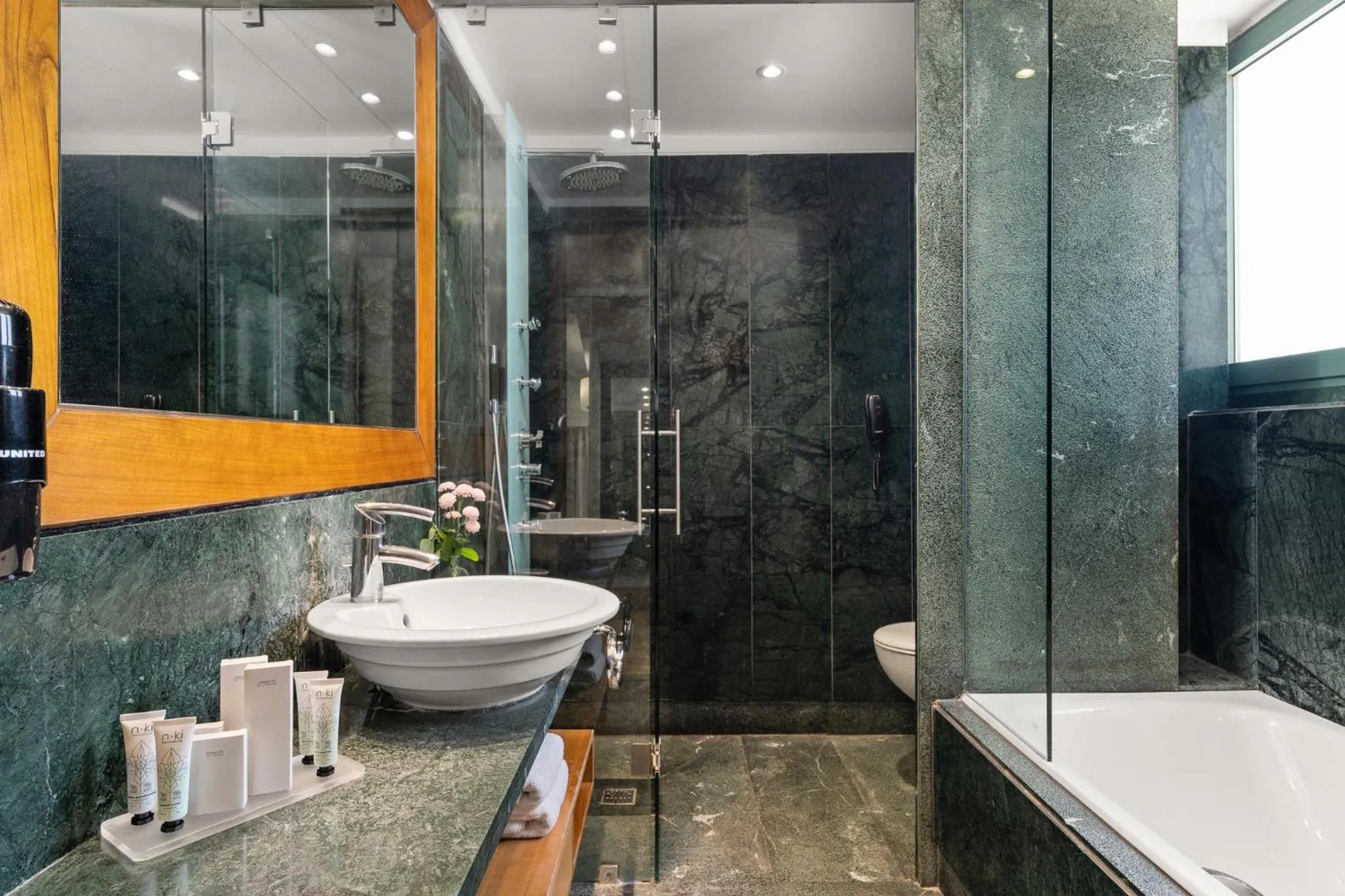 Bathroom in Athenaeum Eridanus Luxury Hotel