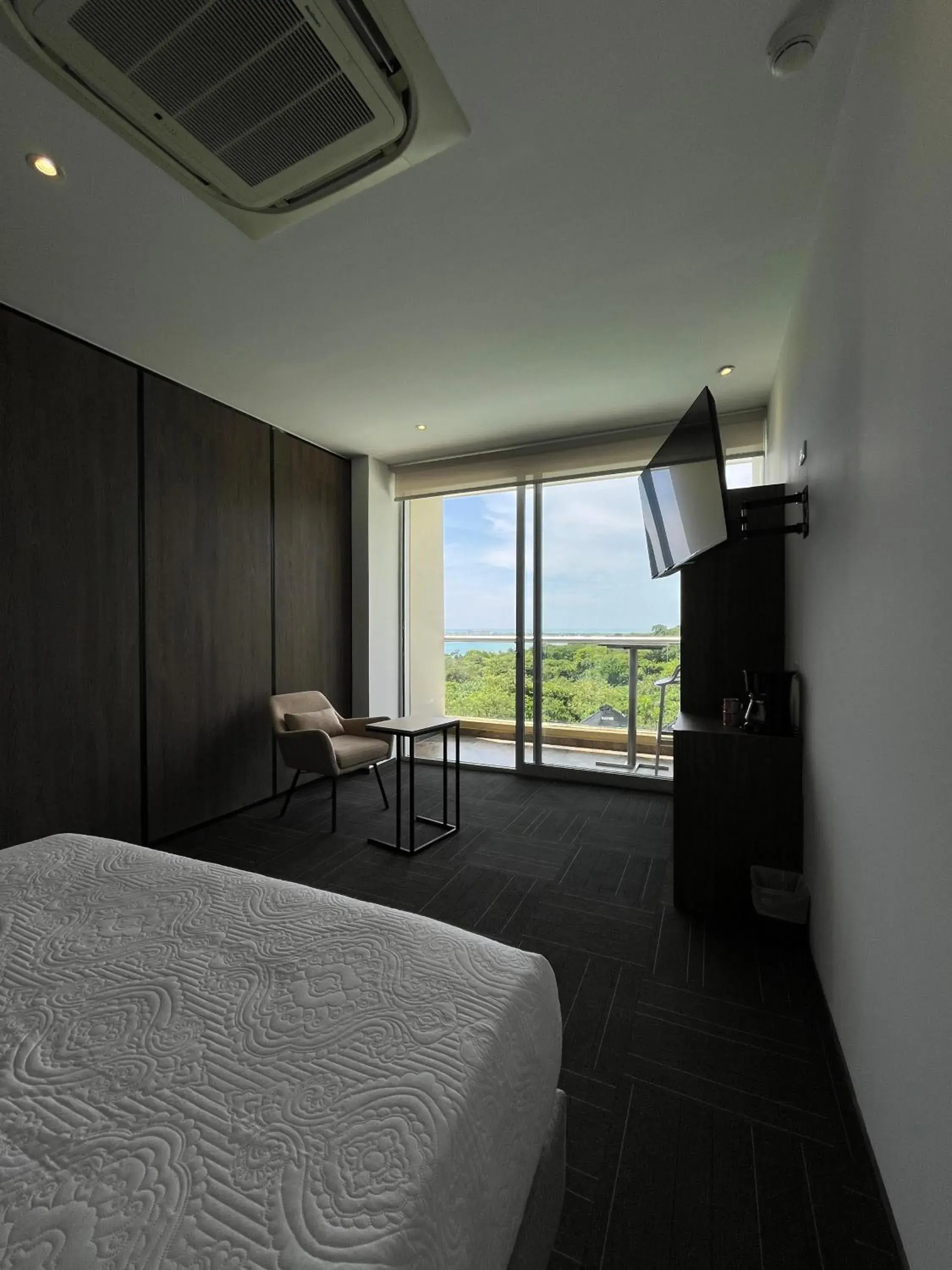 Deluxe Double Room with Balcony and Sea View in Hotel Explore Caño Dulce Deluxe Double Room with Balcony and Sea View in Hotel Explore Caño Dulce