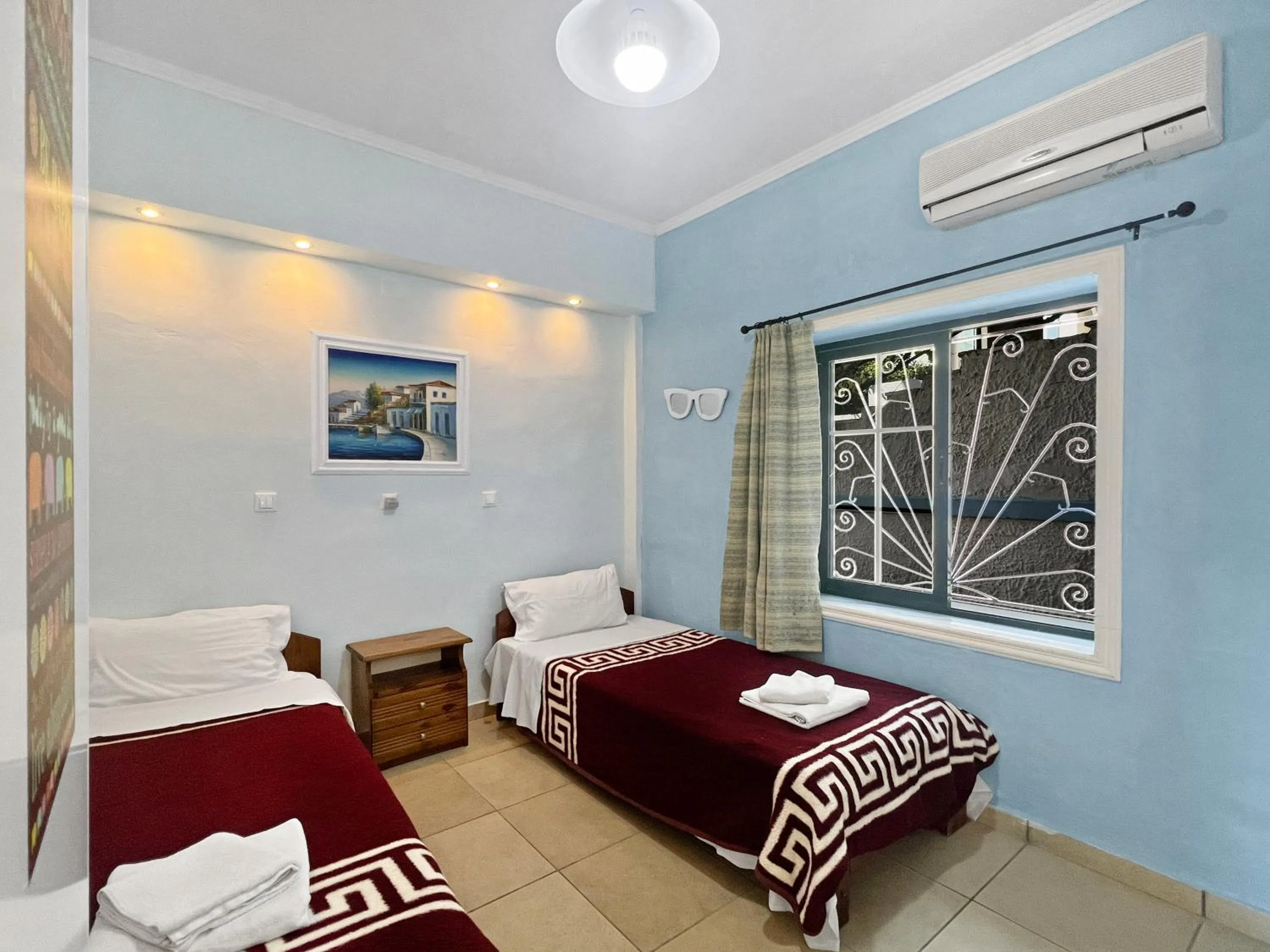 Bed in Corfu Andromaches Holiday Apartments